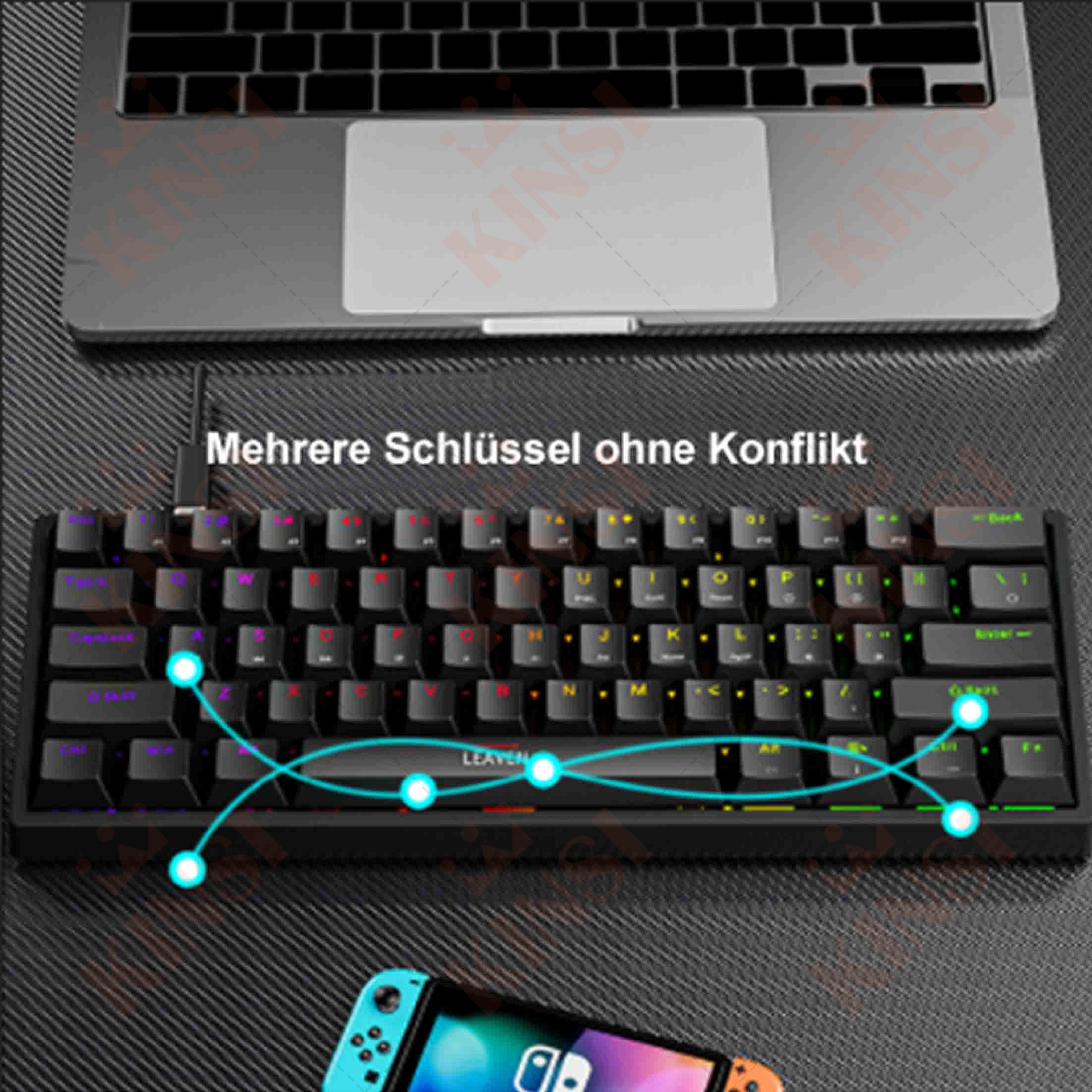 Klawiatura na biurku z laptopem i konsolą. Klawiatura jest czarna.