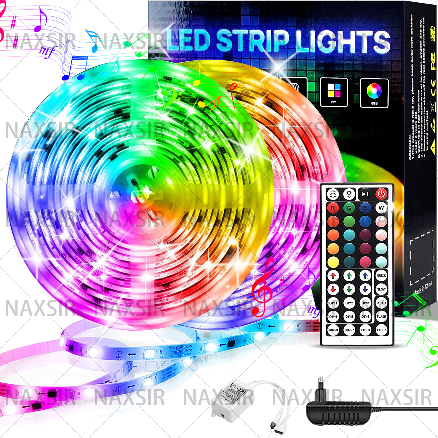 LED-Streifenlichter in einer Rolle, verschiedene Farben und eine Fernbedienung. Die Box ist sichtbar.