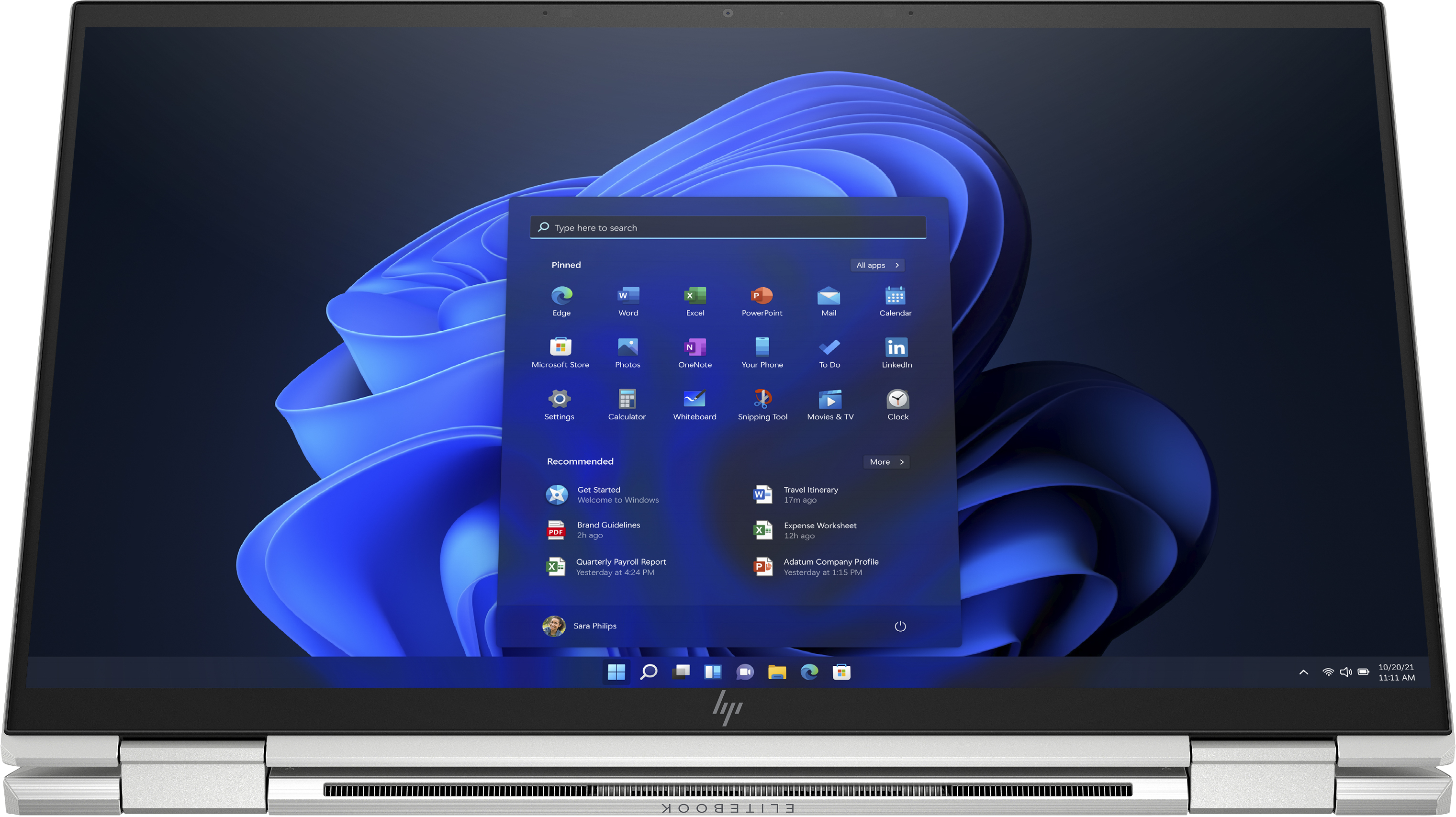 Laptop mit Windows 11 Oberfläche. Blau-Schwarz-Farbschema. Bildschirm zeigt App-Symbole.
