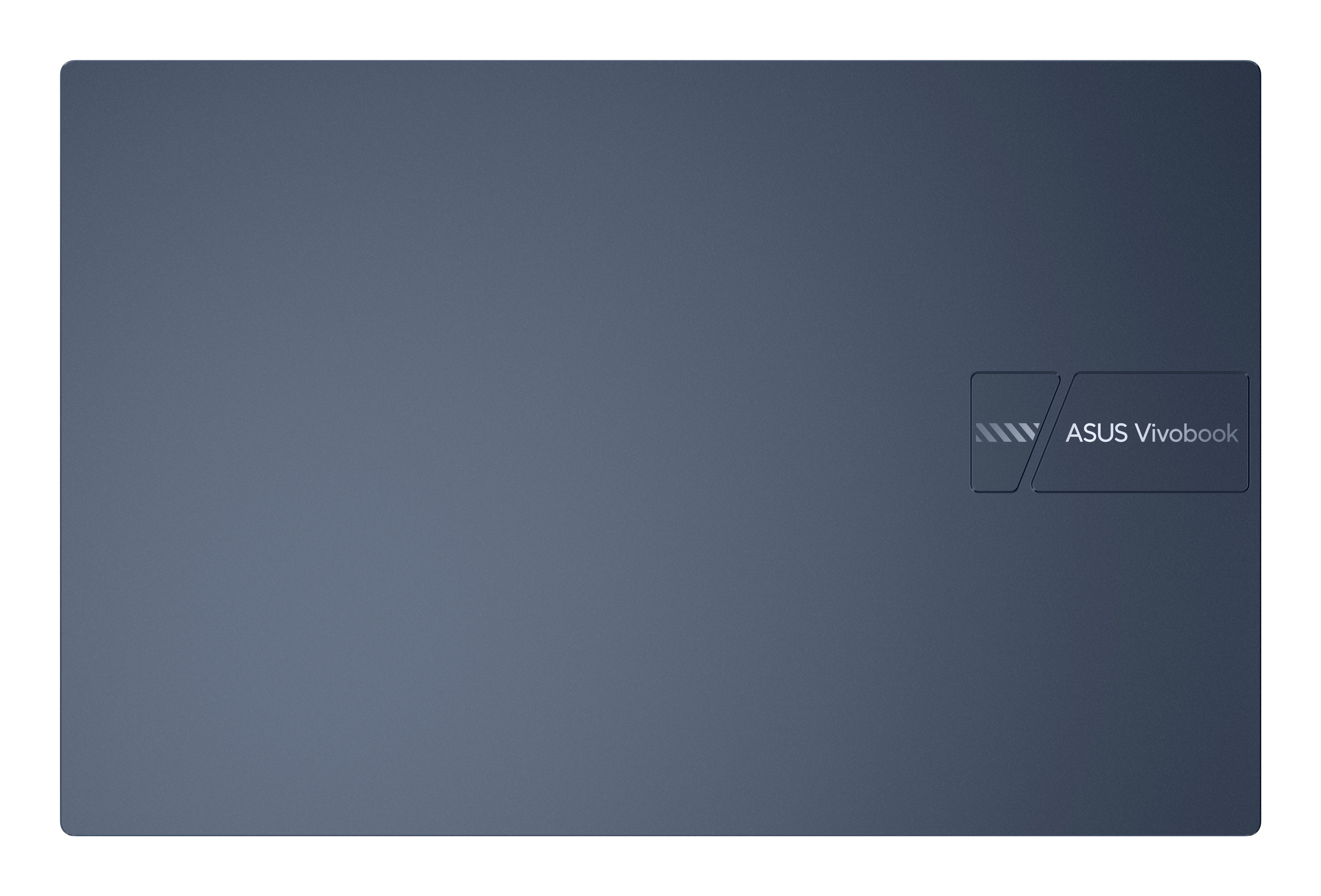Ciemnoniebieski laptop, zamknięty. Widok z góry na tył.
