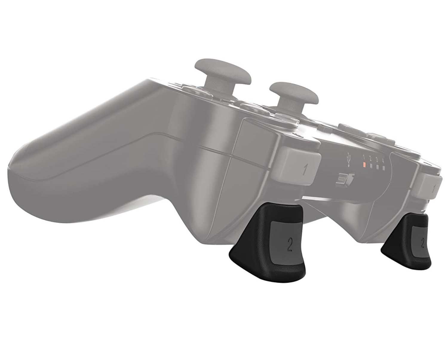 Ein grauer Controller mit zwei schwarzen Griffen mit der Nummer 2 darauf. Grauer Hintergrund.