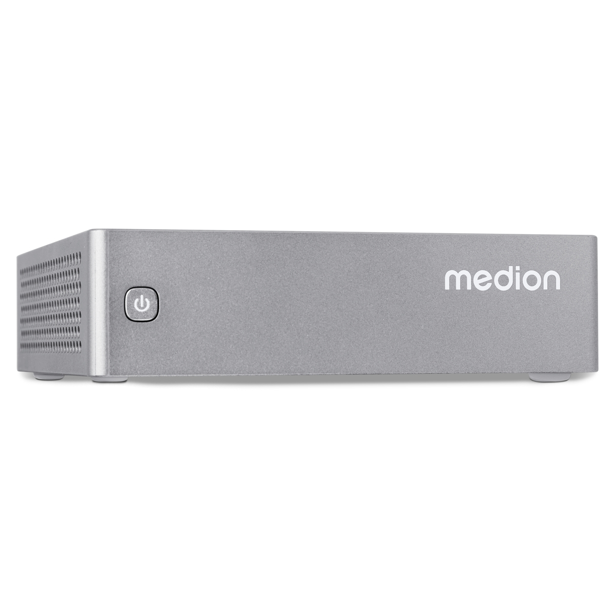 Una computadora plateada Medion. Tiene un botón de encendido y una ventilación lateral. El texto Medion es visible.