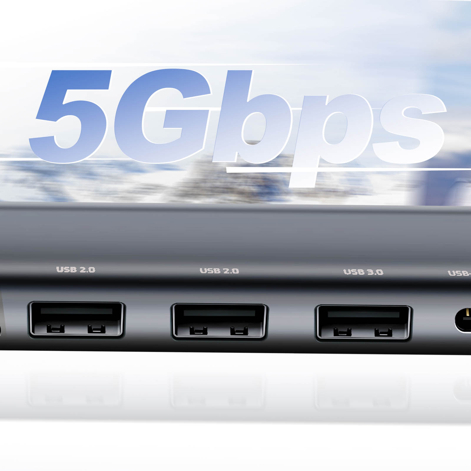 Primo piano di un hub USB nero con porte USB. Testo: 5 Gbps. Porte: USB 2.0 e USB 3.0.