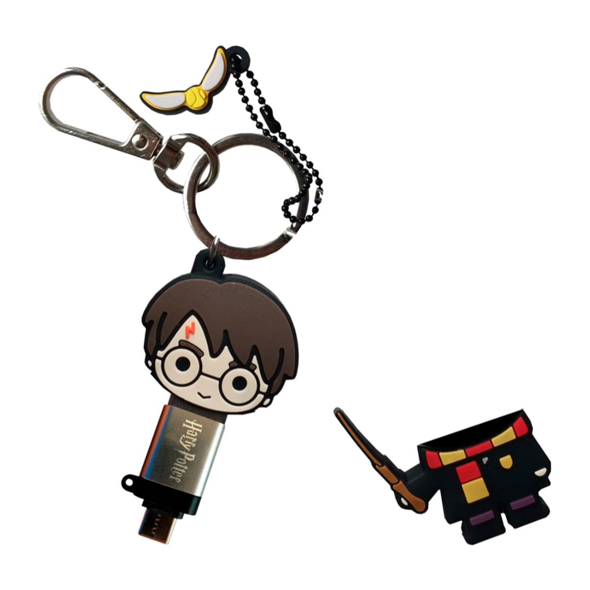 Ein Harry-Potter-Schlüsselanhänger mit zwei Anhängern. Einer ist Harry, der andere ein goldener Schnatz.