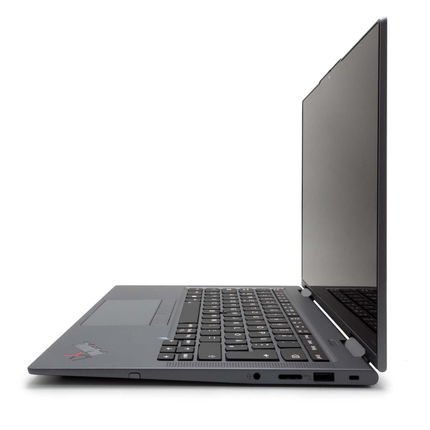 Laptop-Seitenansicht, grau. Geschlossen. Anschlüsse sichtbar. Isoliert auf weißem Hintergrund. Schlankes Design.