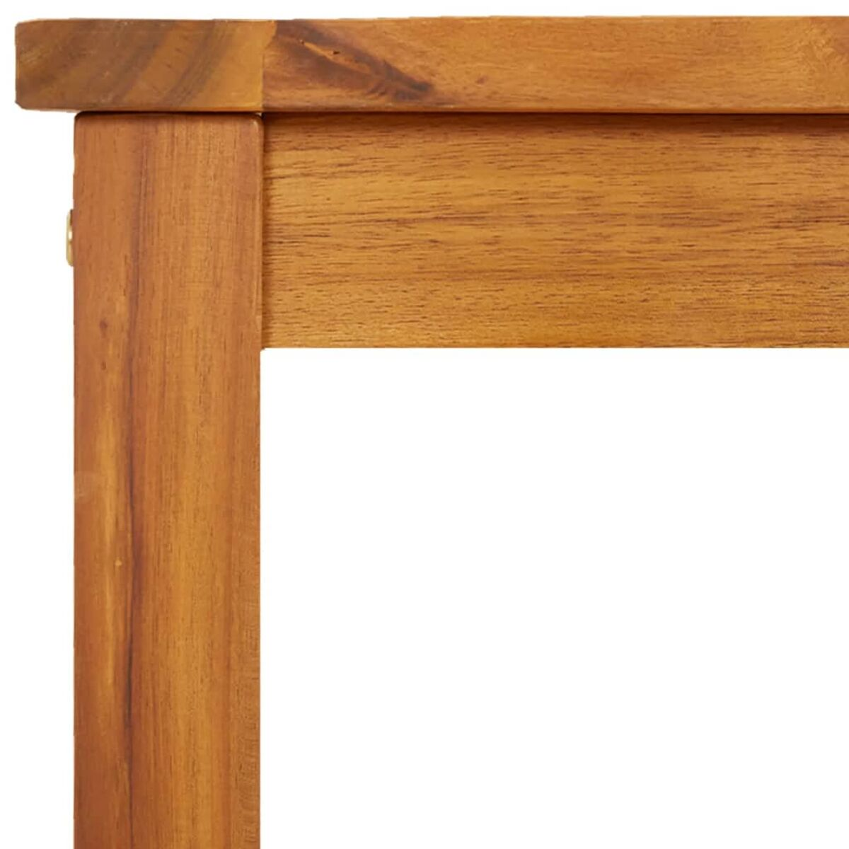 Angolo di tavolo in legno, primo piano, con colore marrone chiaro.