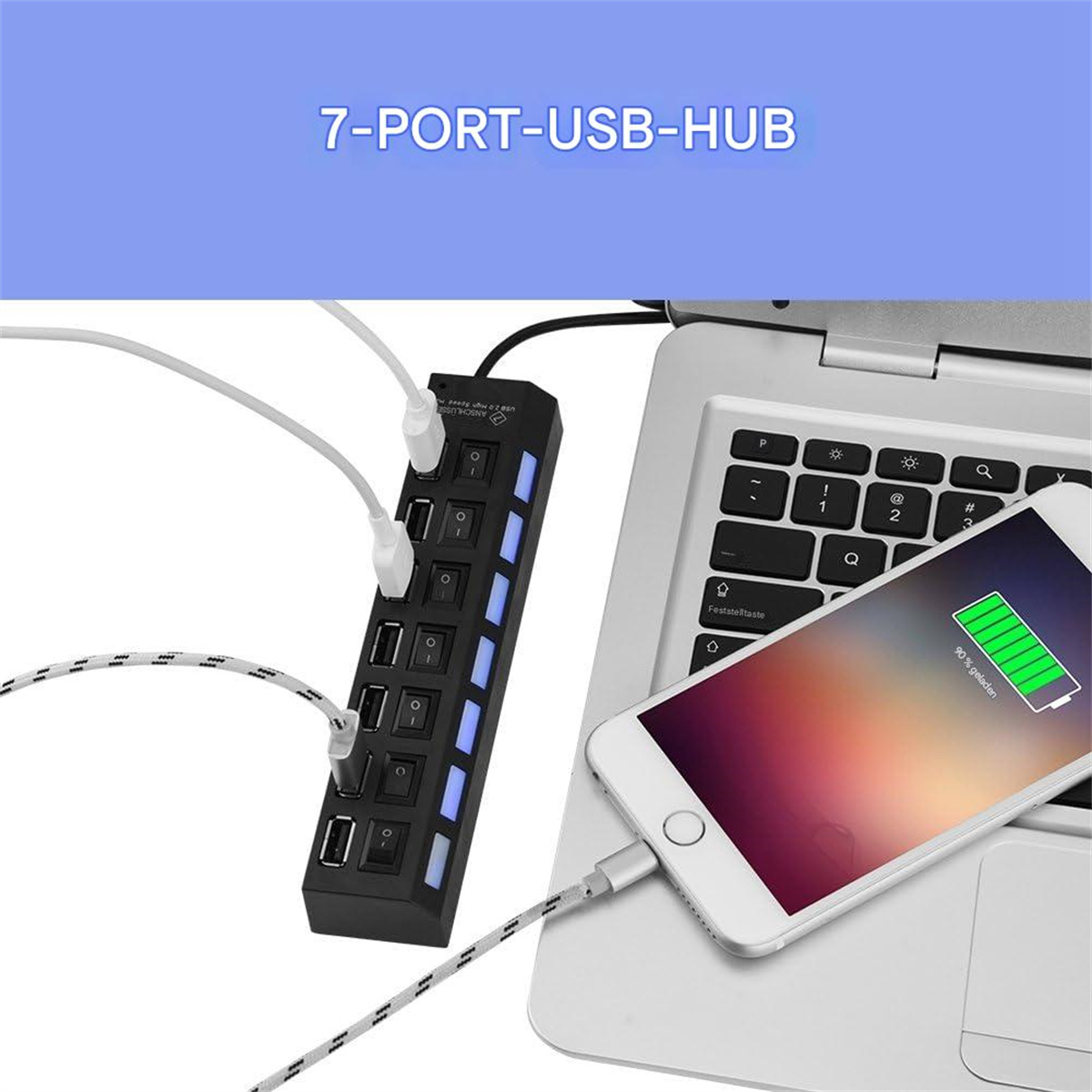 7-Port USB-Hub an Laptop und Handy angeschlossen. Handy wird geladen. Der Hub hat Lichter.