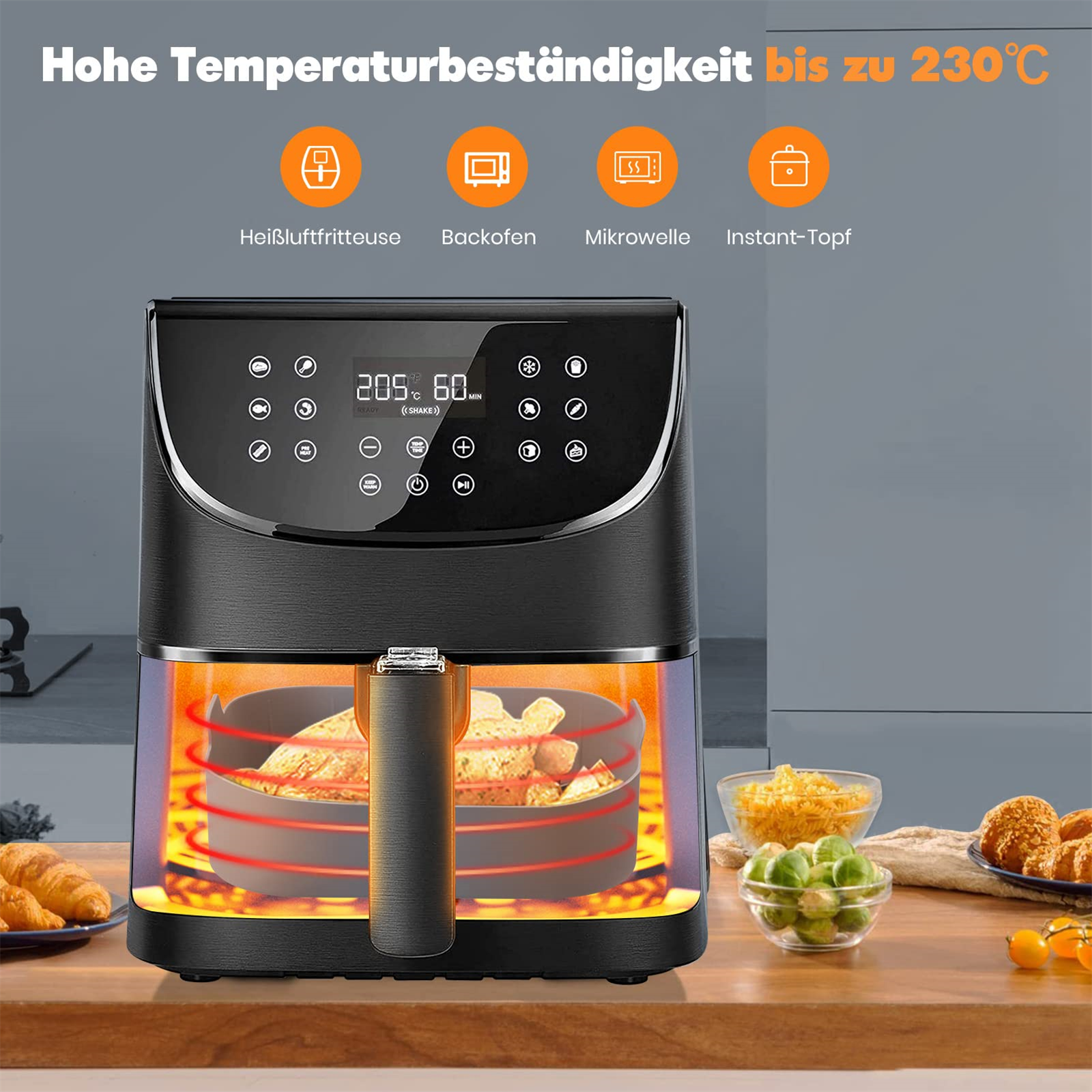 Schwarze Heißluftfritteuse mit Essen darin. Text sagt Hochtemperaturbeständigkeit bis zu 230°C.