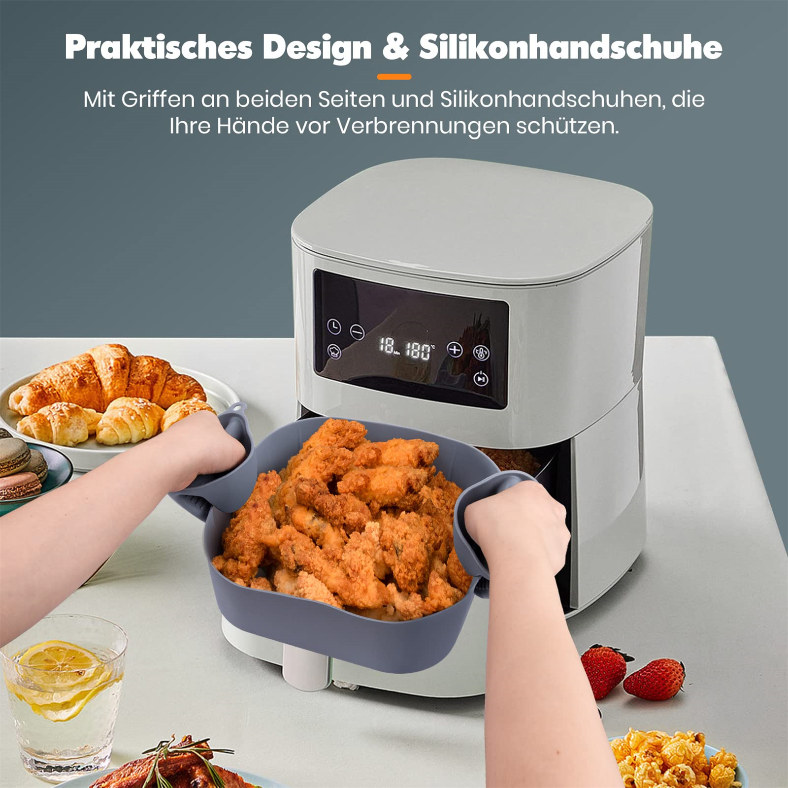 Heißluftfritteuse mit Essen und Händen, die einen Korb halten. Grau und weiß.