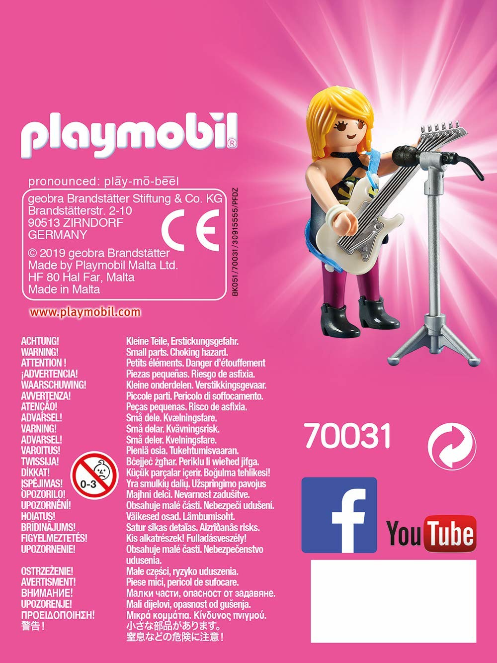 Scatola Playmobil raffigurante una rock star femminile, chitarra e palco.