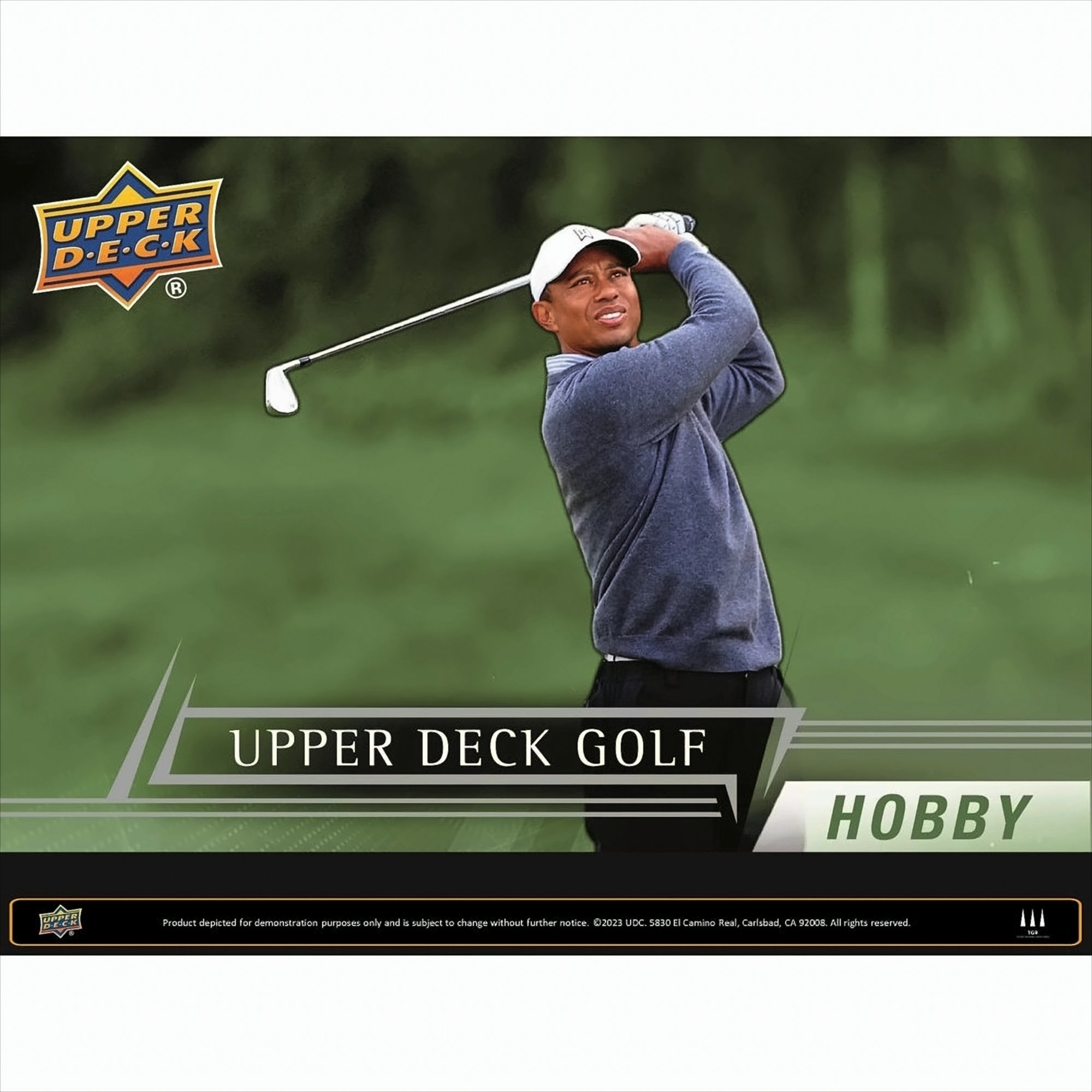 Upper Deck Golfkarte mit Tiger Woods beim Golfschwung vor grünem Hintergrund mit Text.