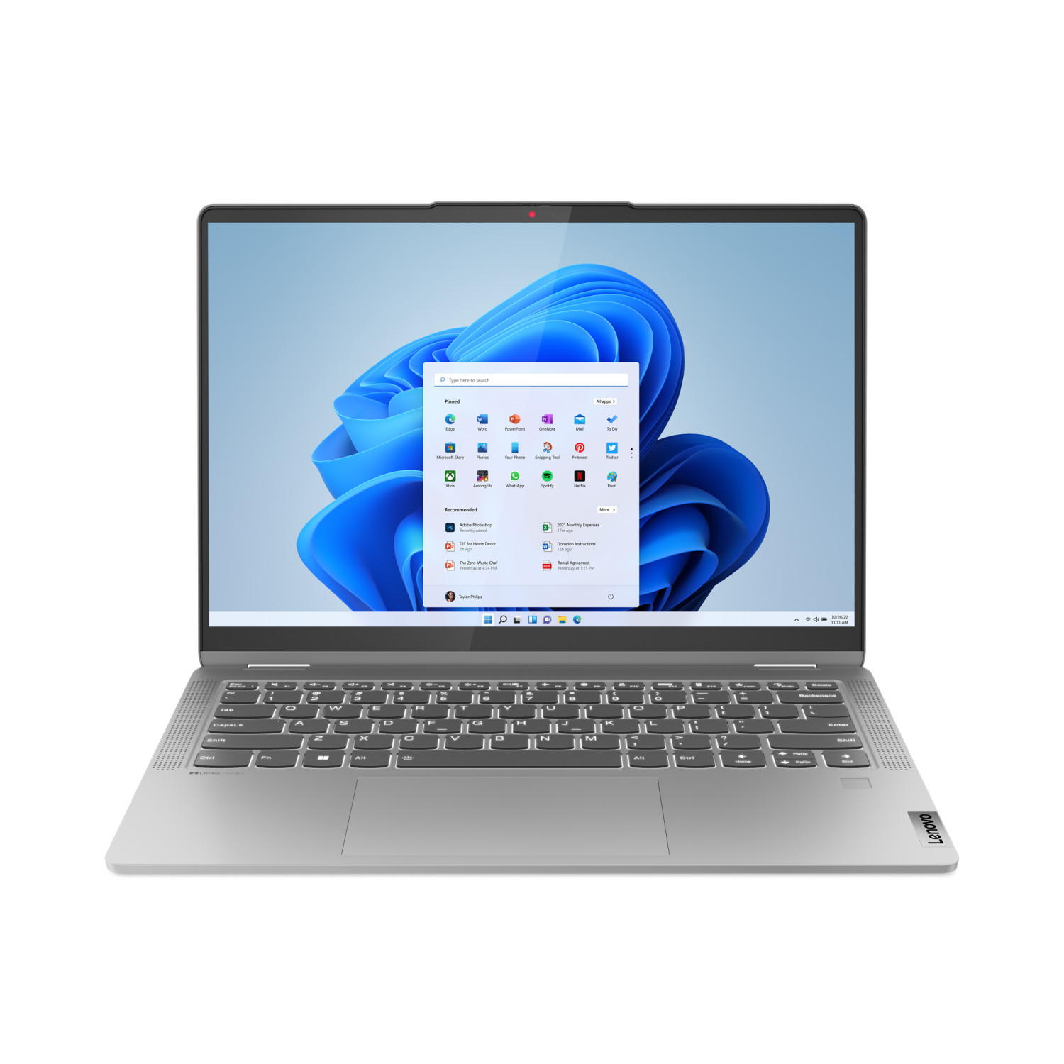 Laptop argentato con tastiera nera, che mostra Windows 11. Lo schermo mostra icone di applicazioni.