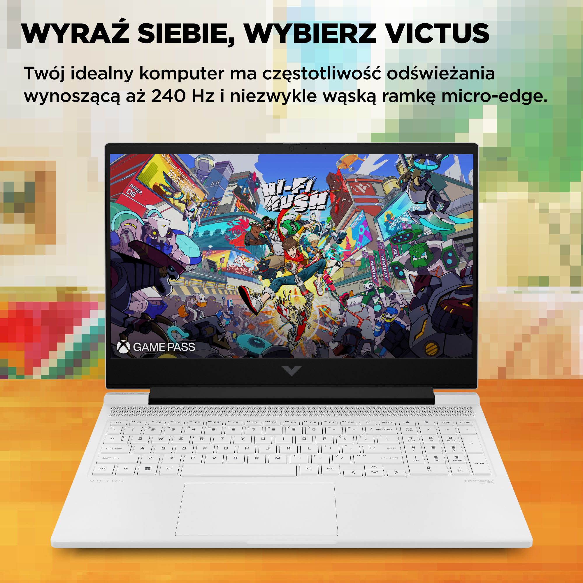 Biały laptop z kolorową grą na ekranie, z białą klawiaturą.