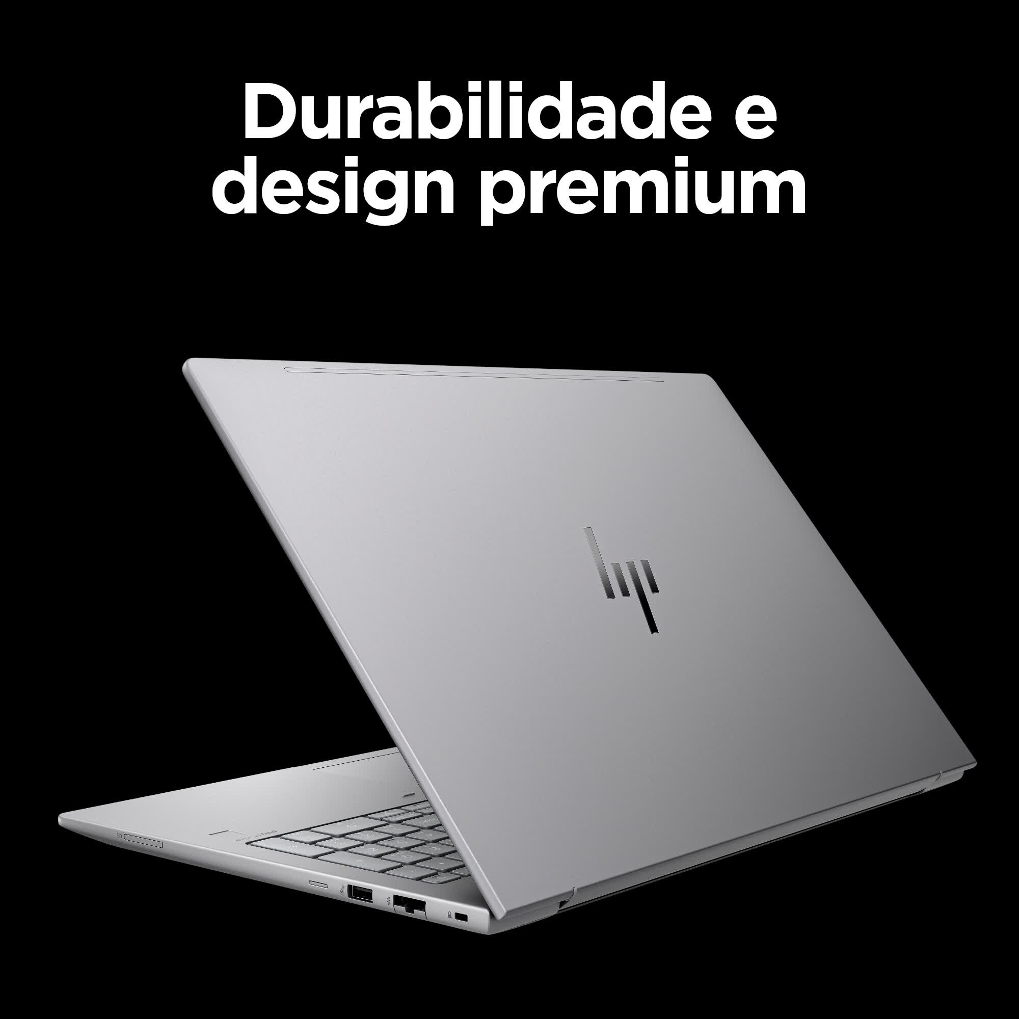 Ein silberner Laptop wird vor schwarzem Hintergrund gezeigt. Der Text 'Durabilidade e design premium' steht darüber.