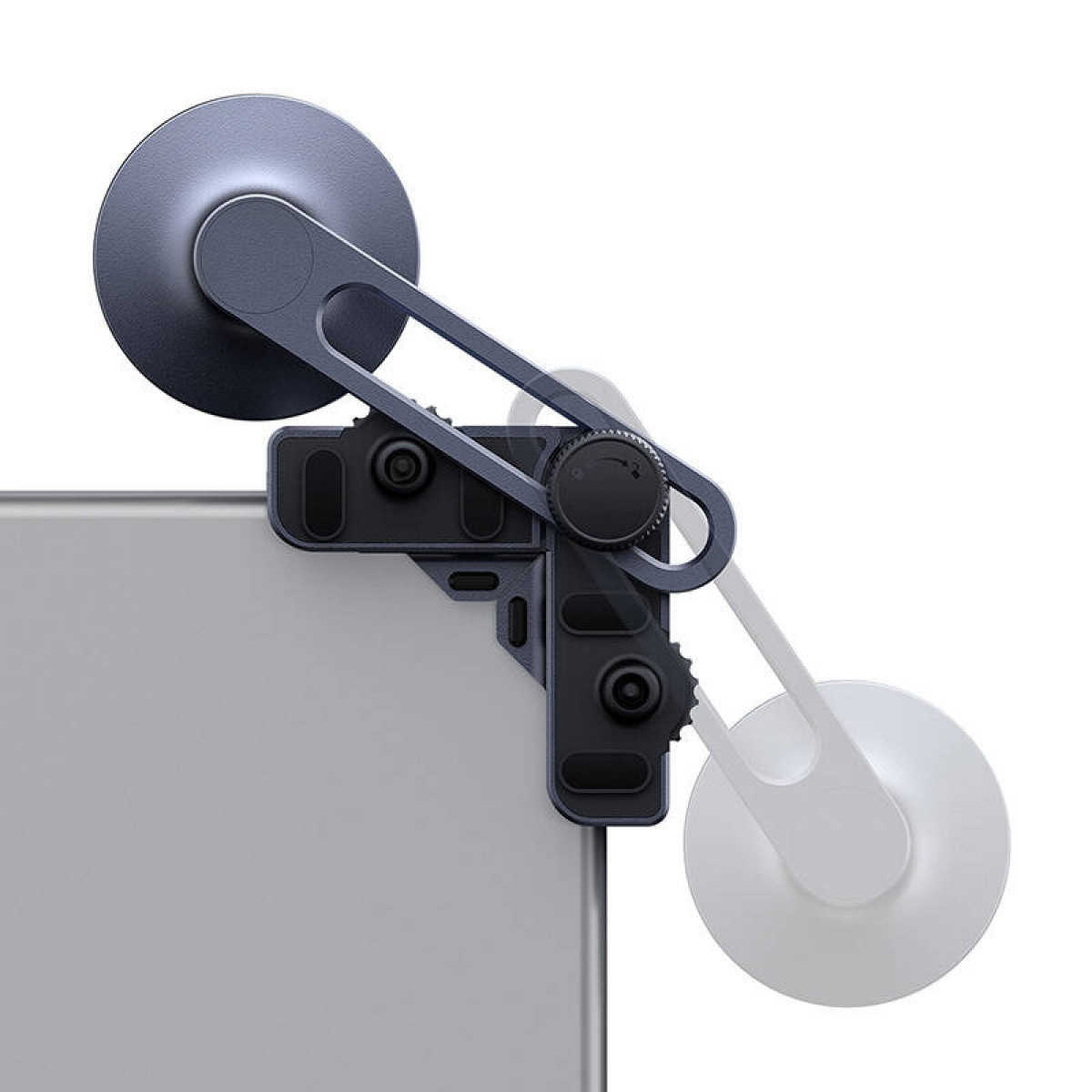 Uchwyt na smartfon przymocowany do tabletu. To ciemne, regulowane urządzenie przypominające zacisk.