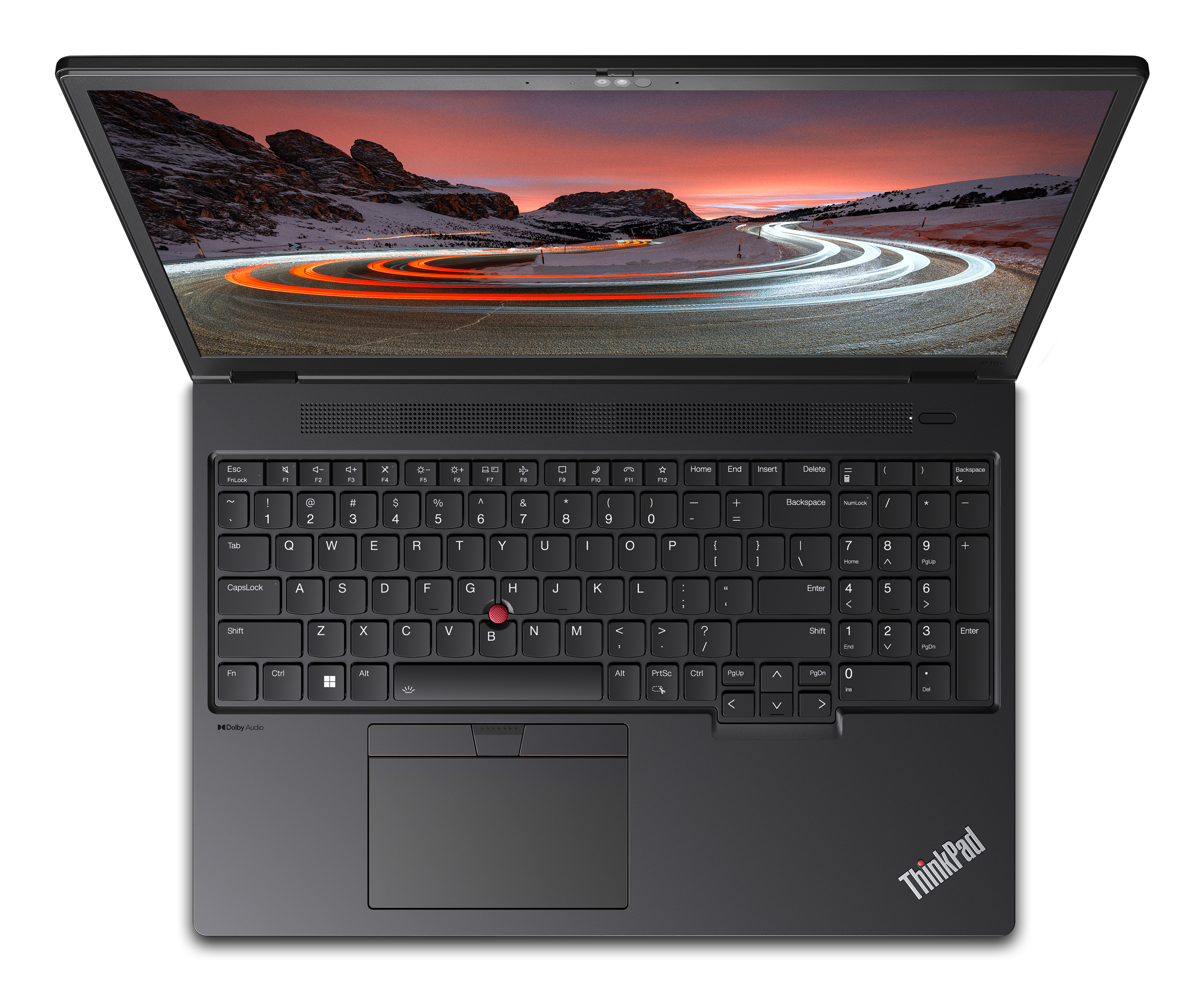 Laptop nero aperto su un tavolo. Lo schermo mostra una strada di montagna innevata. Tastiera nera.
