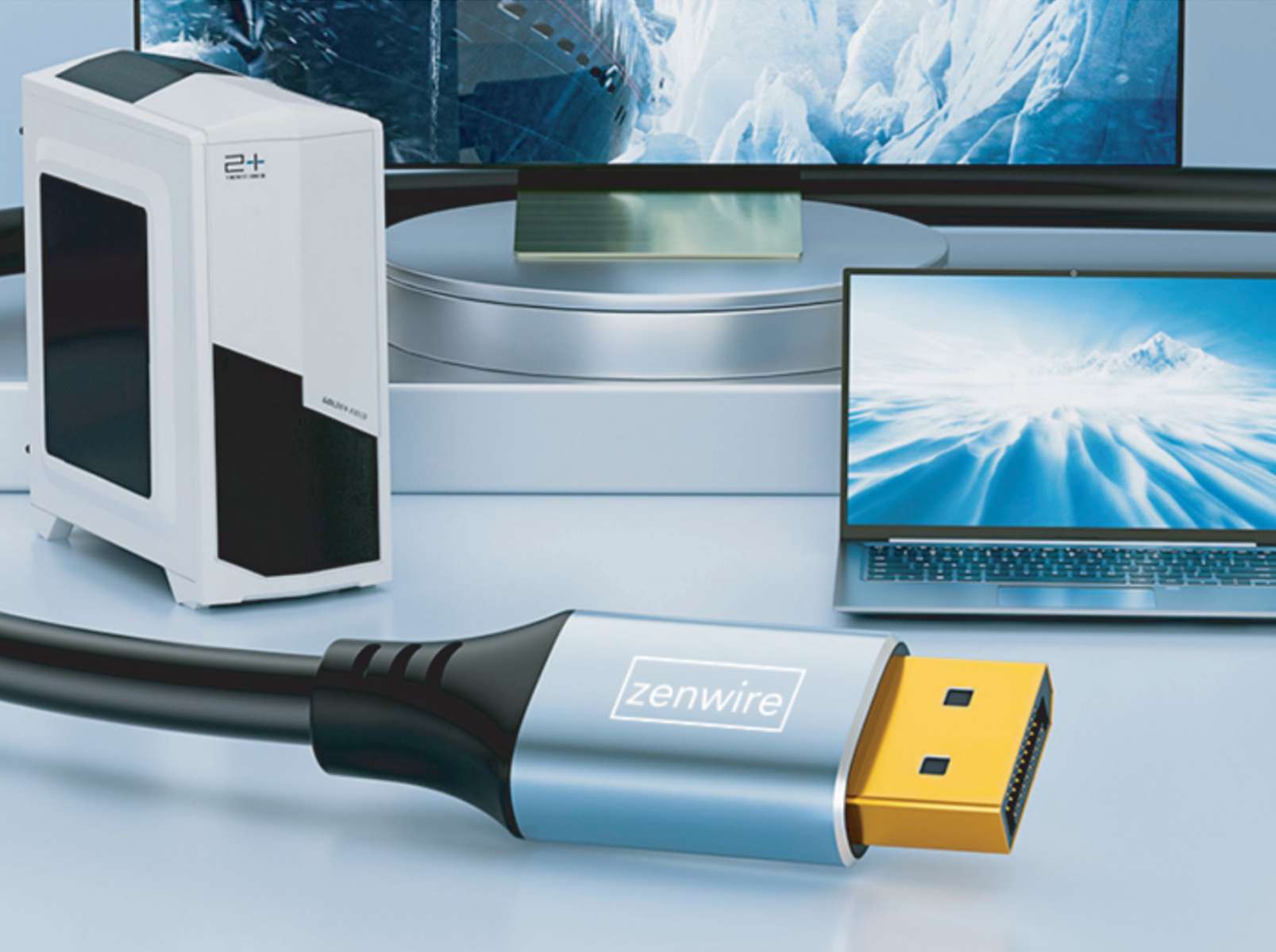 Wieża komputera i laptop, połączone czarnym kablem z logo zenwire.