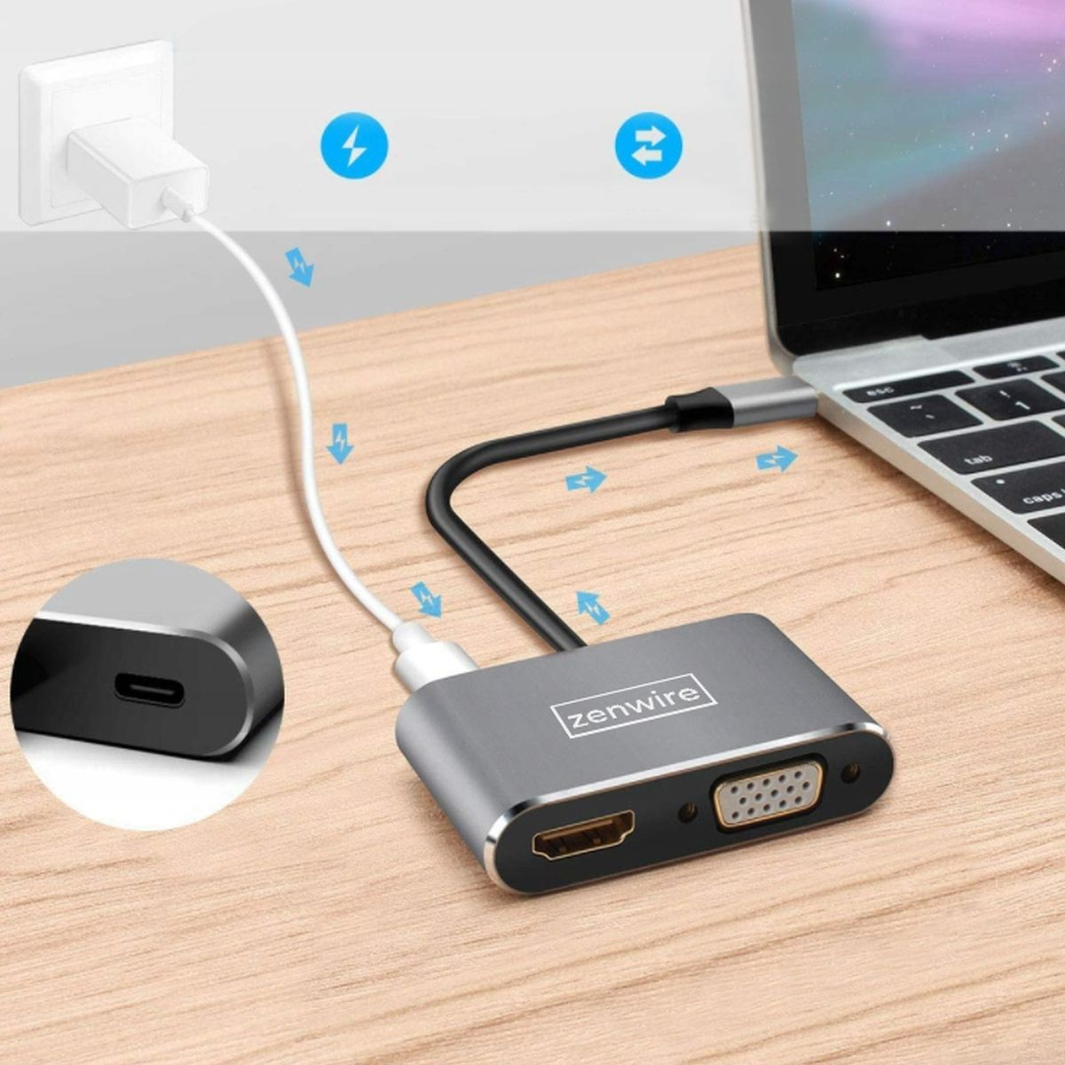 Srebrny adapter z portami HDMI, VGA i USB-C jest podłączony do laptopa i źródła zasilania.