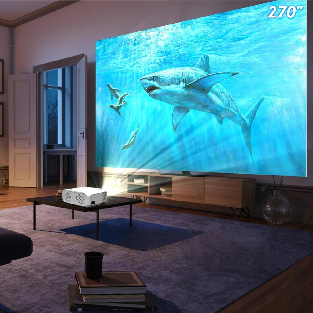 Projektor wyświetla film o rekinach na ścianie. Czarny stół i dywan na pierwszym planie.