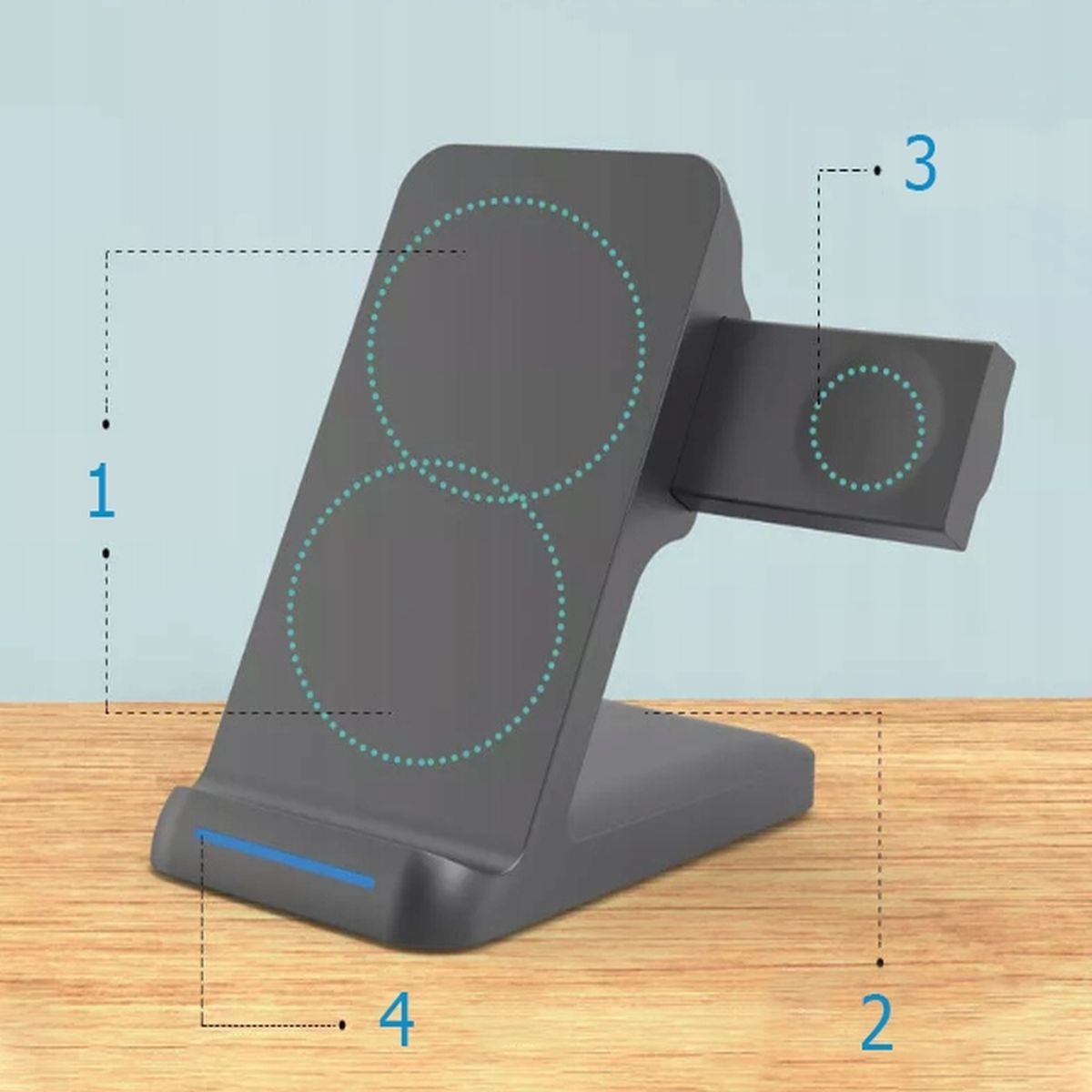 Stacja ładująca z zaznaczonymi obszarami ładowania telefonu i zegarka. Niebieskie światło u podstawy.