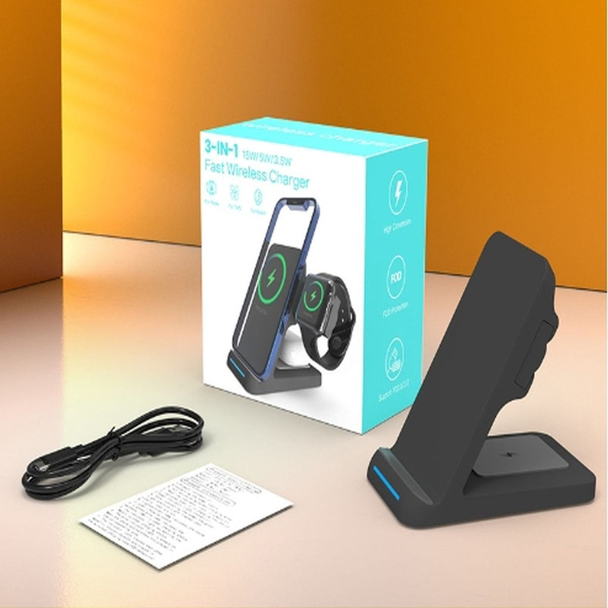 Stacja ładująca z telefonem i zegarkiem na górze. Opakowanie, kabel i papier również widoczne.