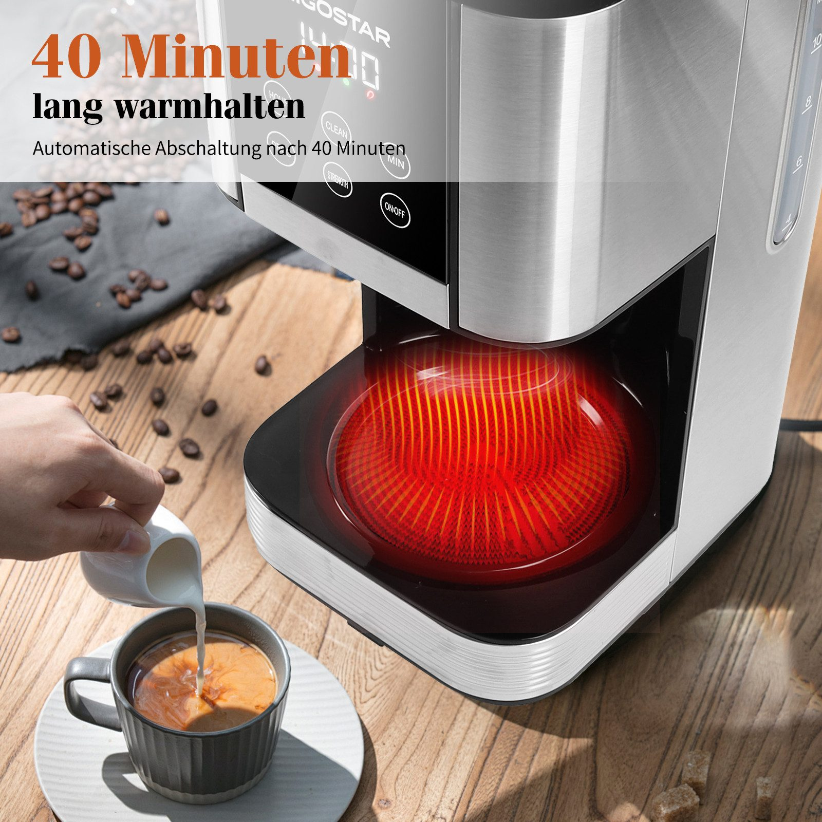 Cafetera con texto '40 Minuten' y persona vertiendo leche en café.