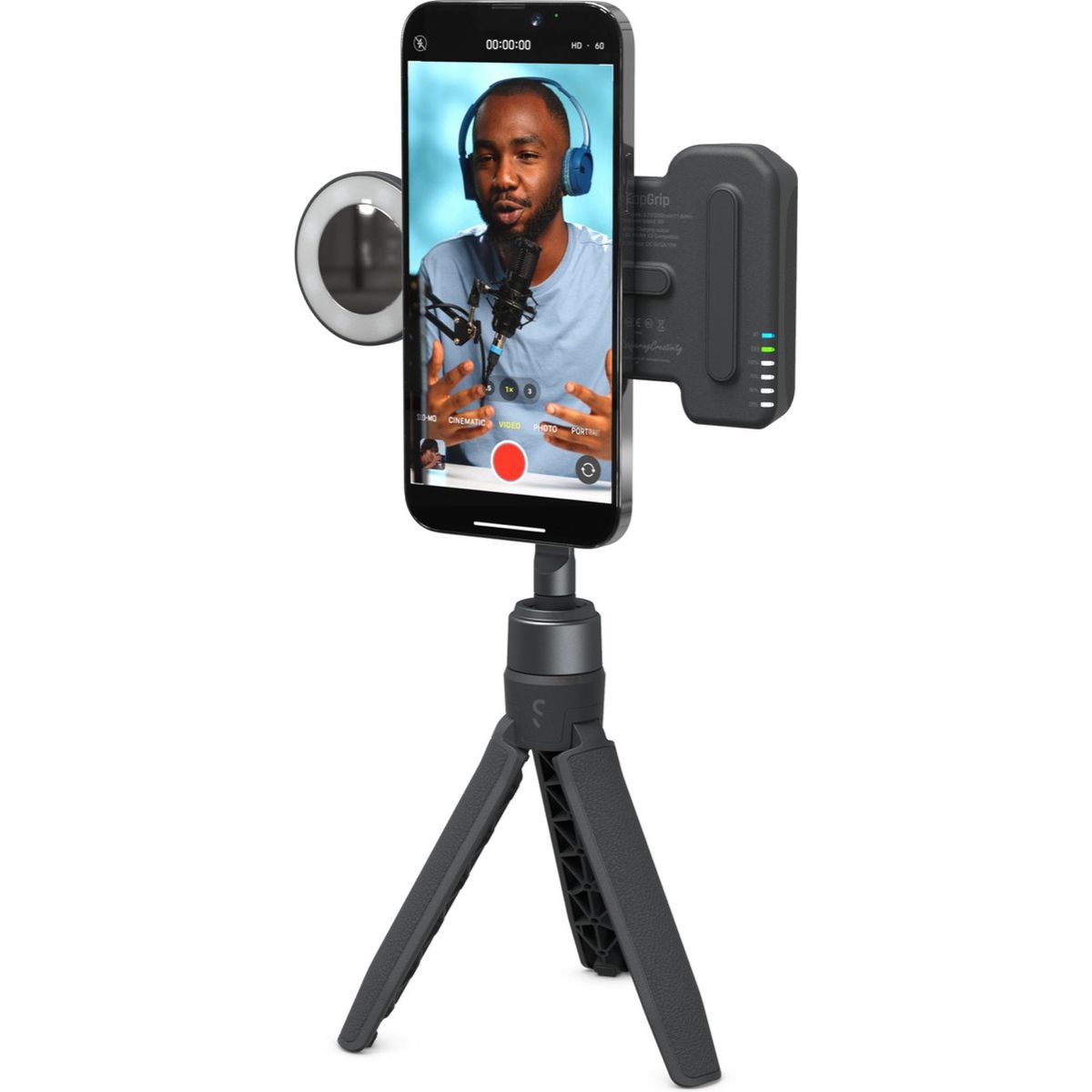 Tripod üzerinde telefon, halka ışığı ve tutacağı var. Ekranda bir video görüşmesi gösteriliyor.