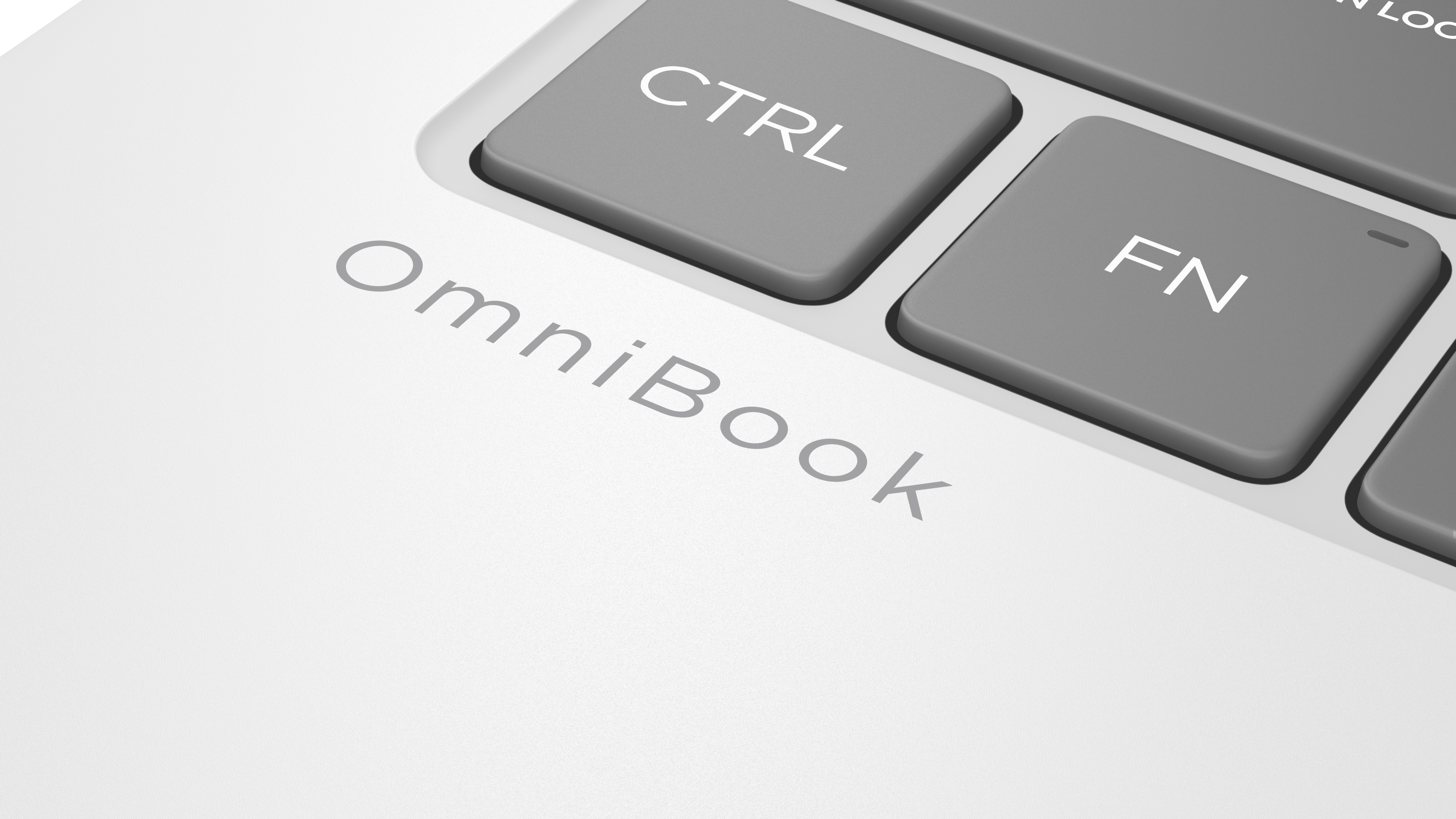 Primer plano del teclado de un portátil blanco. Las teclas 'CTRL' y 'FN' son visibles.
