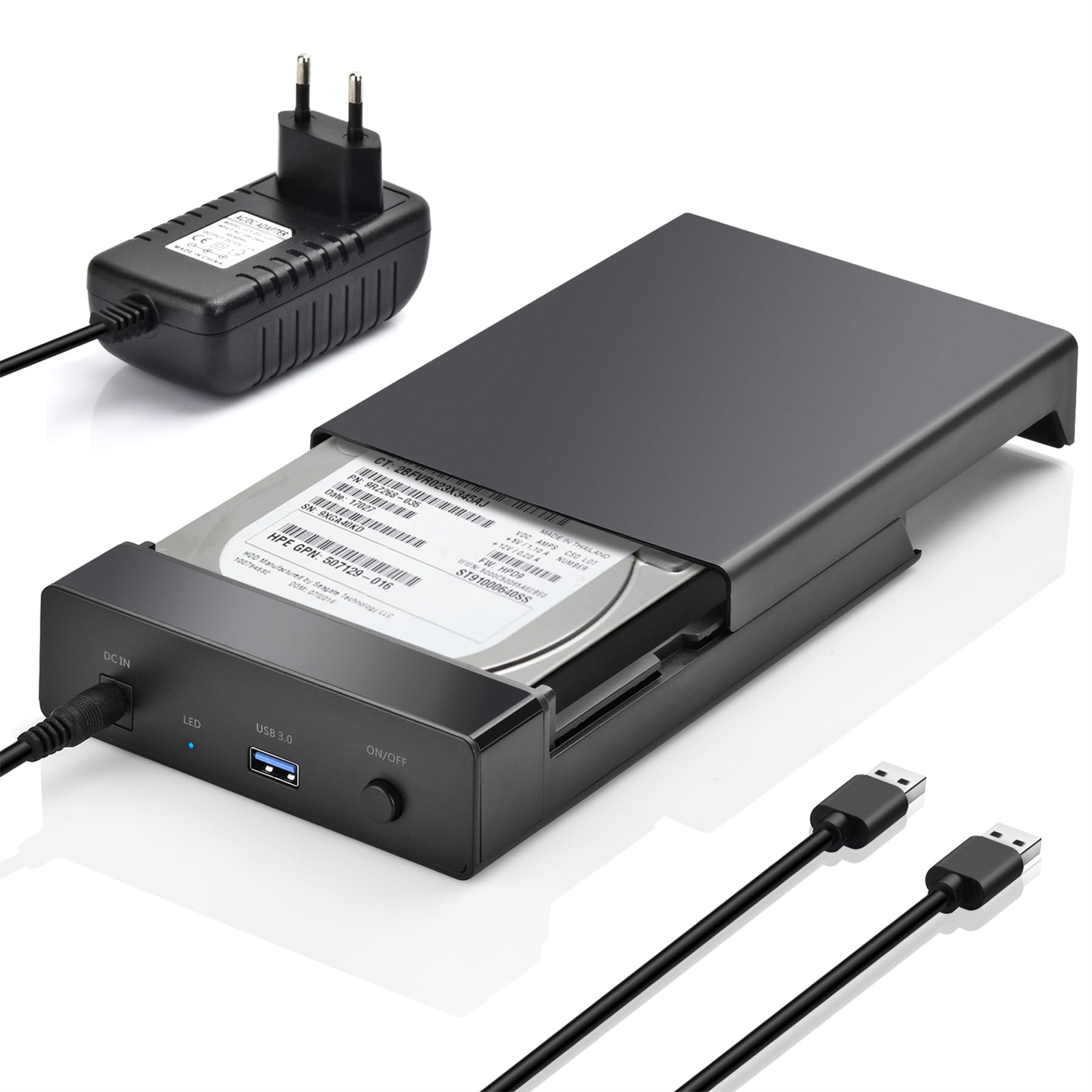 Schwarzes Festplattengehäuse mit Datenkabeln, Netzteil und USB 3.0-Anschluss.