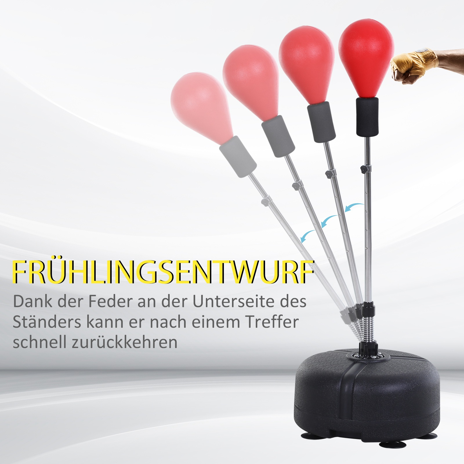 Box-Trainingsgerät. Boxsack mit schwarzem Sockel, roten und rosa Boxbällen.