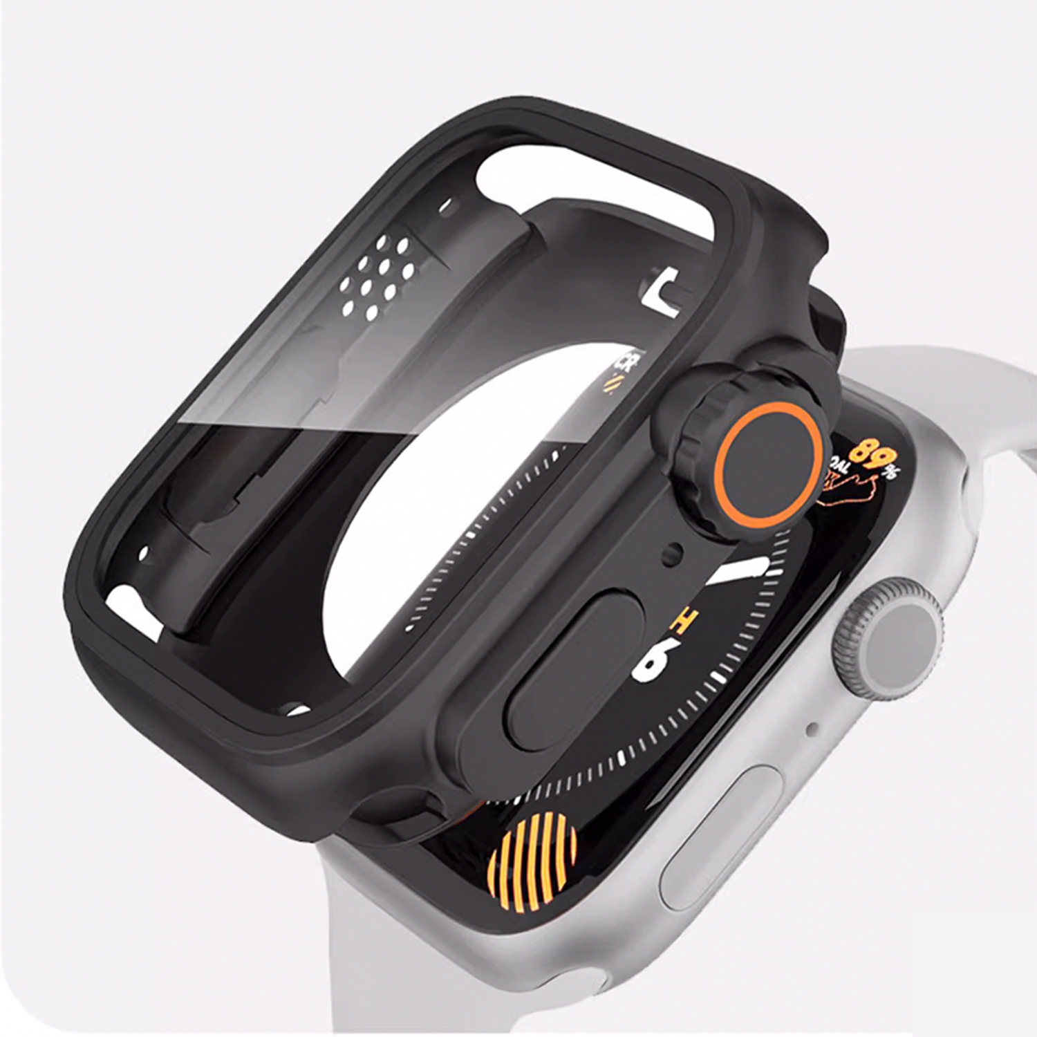 Czarna obudowa Apple Watch na białym zegarku. Przezroczysta ochrona ekranu. Pomarańczowy detal tarczy.