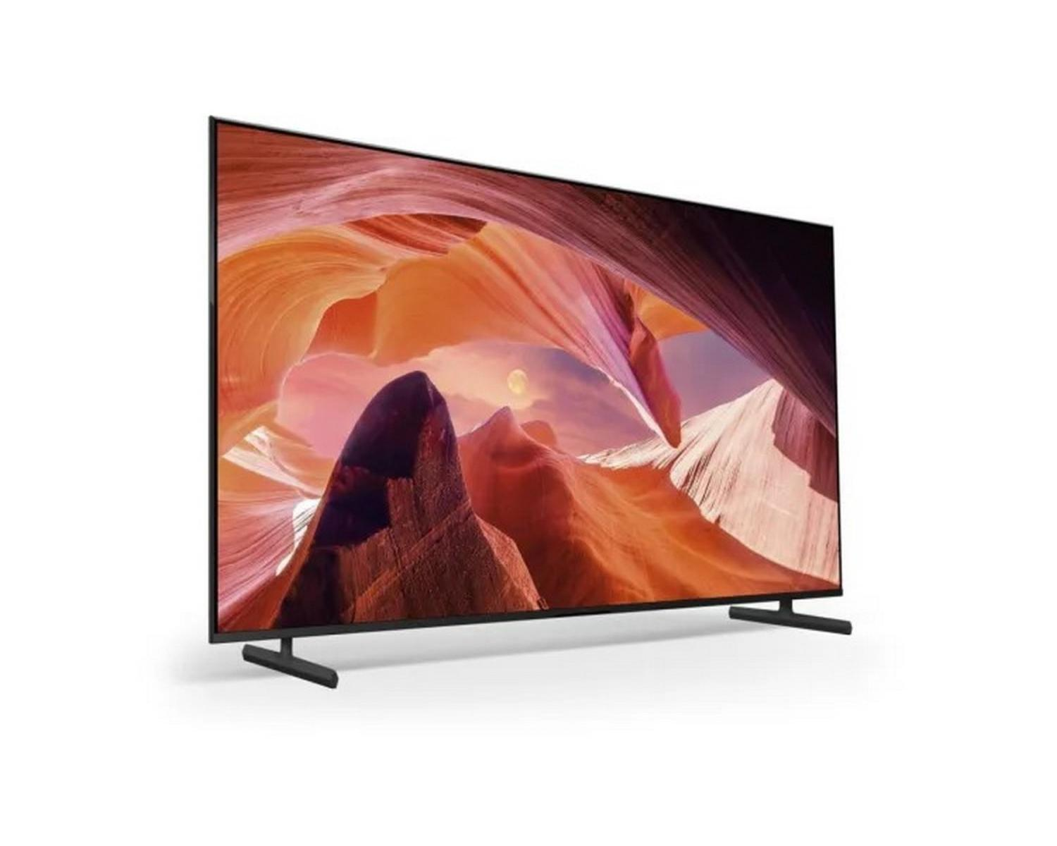 TV a schermo piatto, che mostra una scena desertica arancione e rossa.