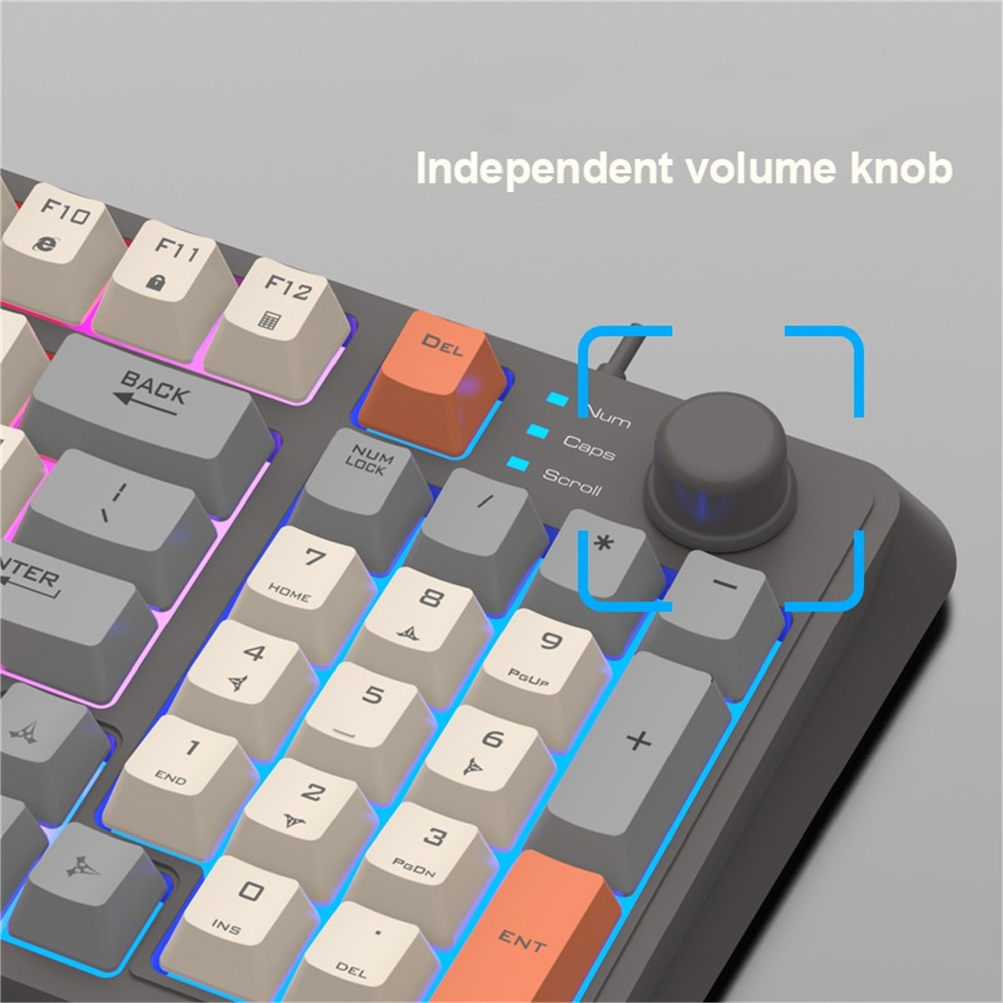 Nahaufnahme einer Gaming-Tastatur mit Lautstärkeregler, weißen und grauen Tasten und orangefarbenen Akzenten.