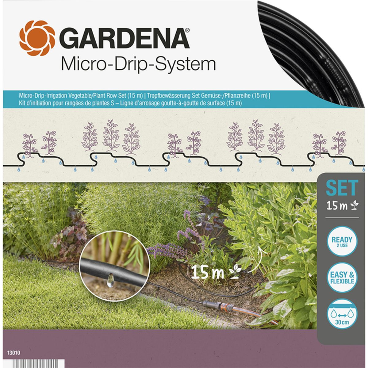 Gardena Micro-Drip-System-Set-Verpackung, mit angezeigten Komponenten, Gartenumgebung.
