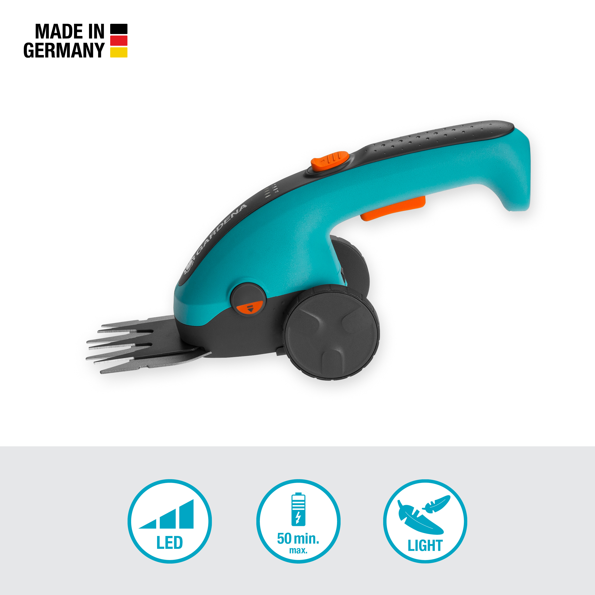 Turkusowo-czarne nożyce do trawy z pomarańczowymi akcentami i kołami.