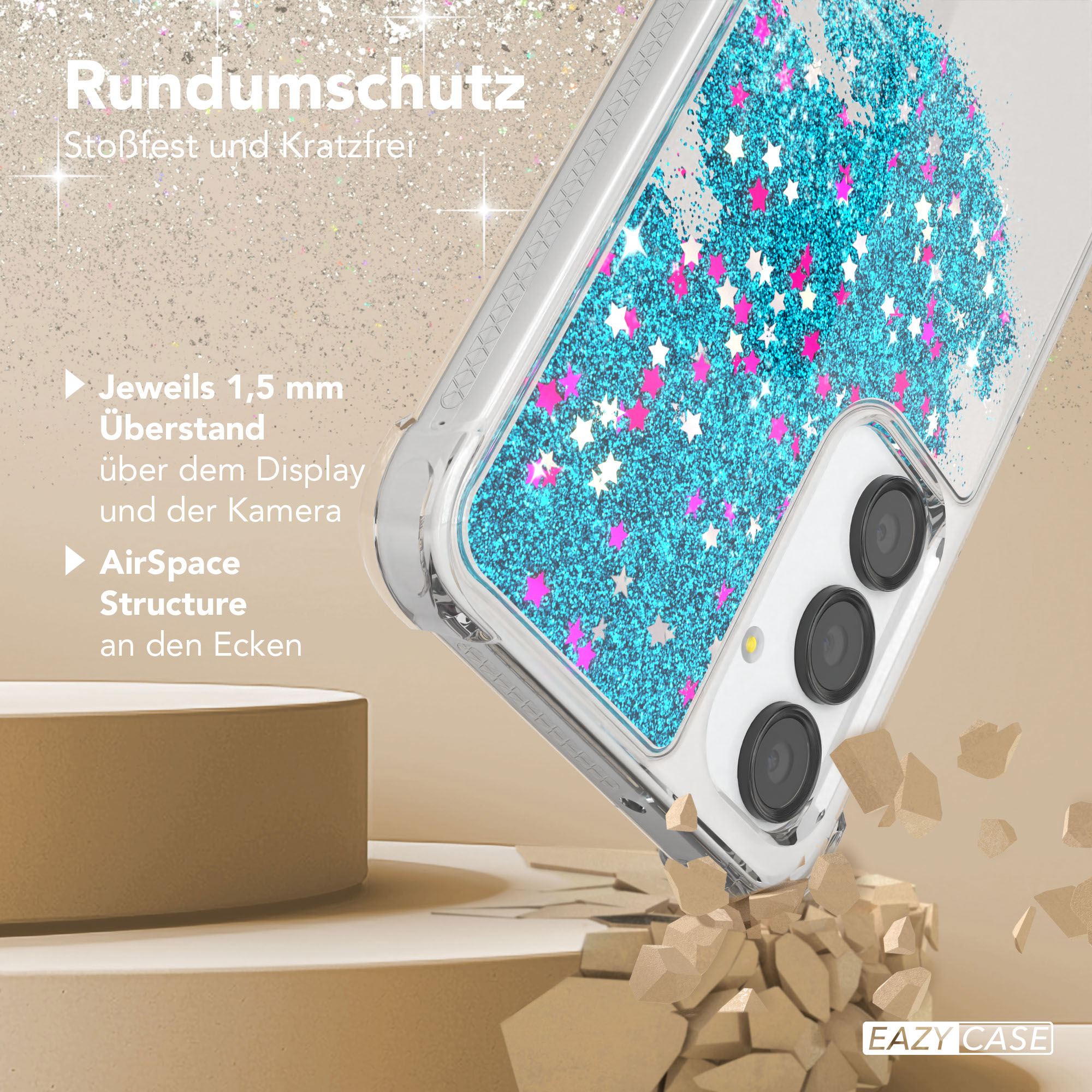 Eine Handyhülle mit blauem Glitzer und rosa Sternen. Sie liegt auf einer Oberfläche und wird fallen gelassen.