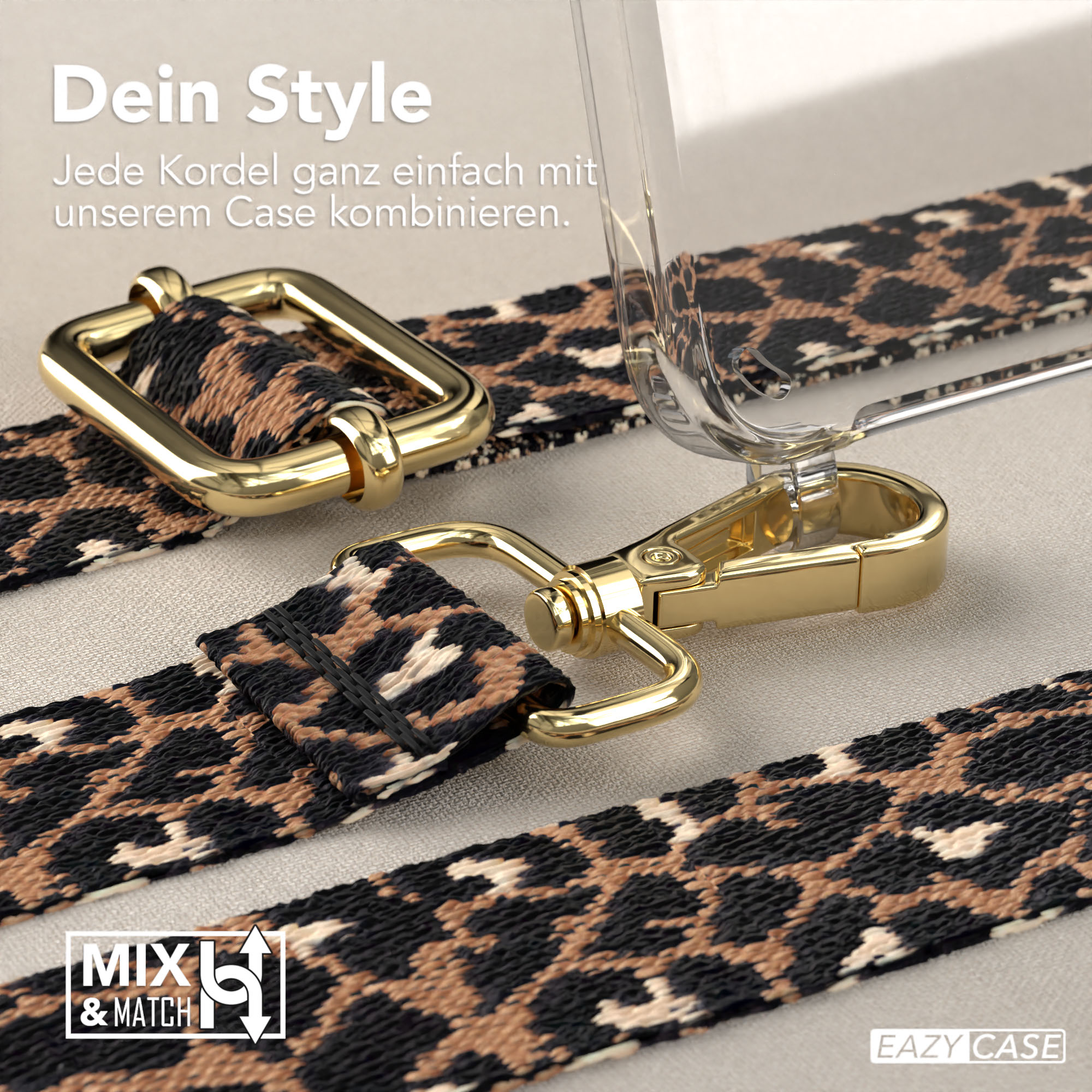 Ein Telefonband mit goldenem Leopardenmuster. Das Band ist mit einer durchsichtigen Handyhülle verbunden.