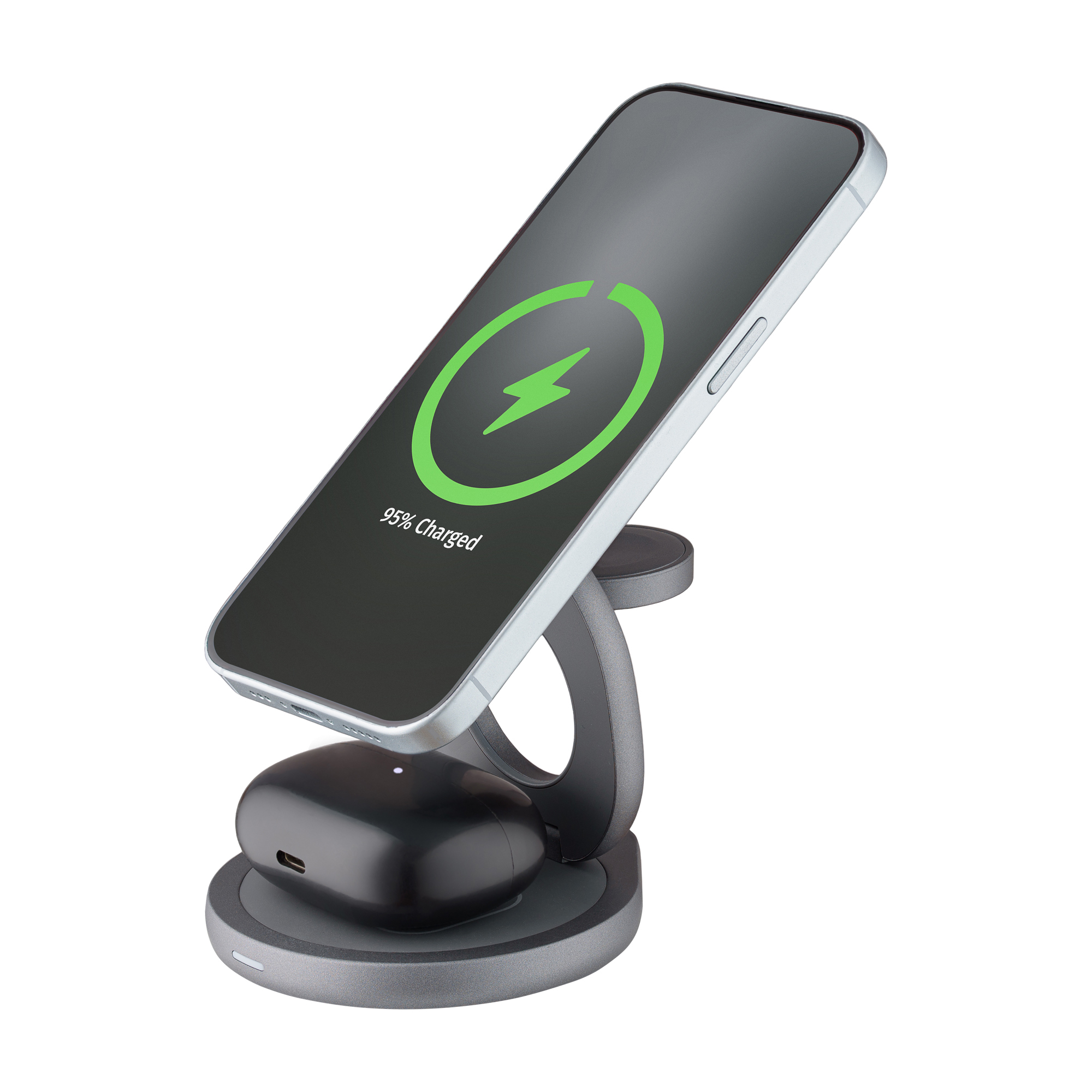 Srebrna ładowarka bezprzewodowa z telefonem i słuchawkami. Telefon pokazuje symbol ładowania. Szara podstawa. Białe tło.