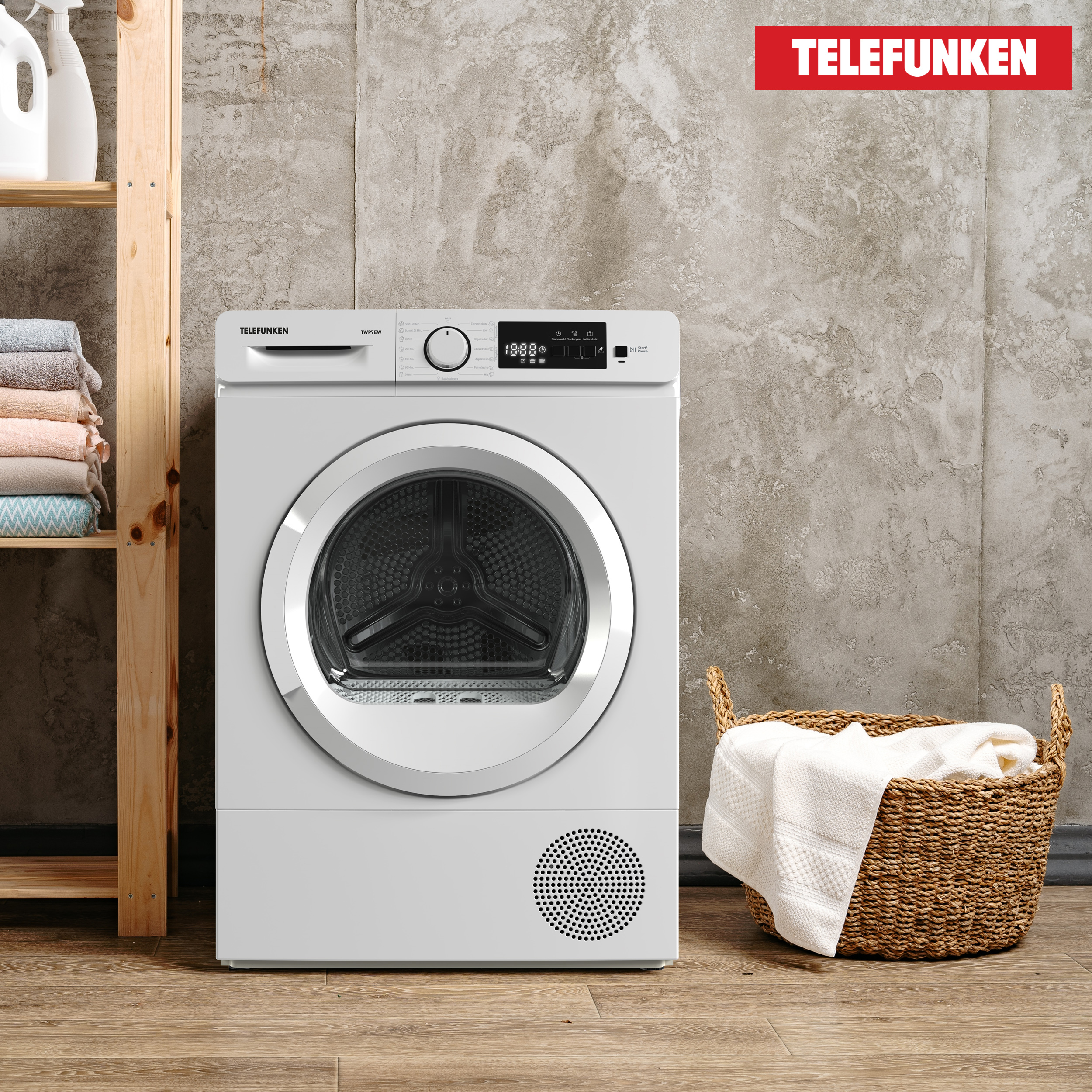 Ein weißer Trockner mit dem Wort TELEFUNKEN. Eine Wäschekorb steht davor. Der Hintergrund ist ein Raum.