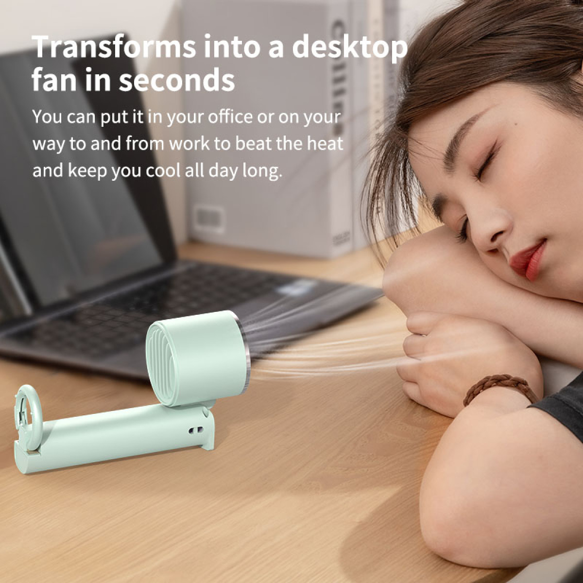 Vrouw die slaapt naast een mintgroene ventilator op een bureau. Laptop staat op het bureau. De tekst zegt: transformeert naar ventilator.