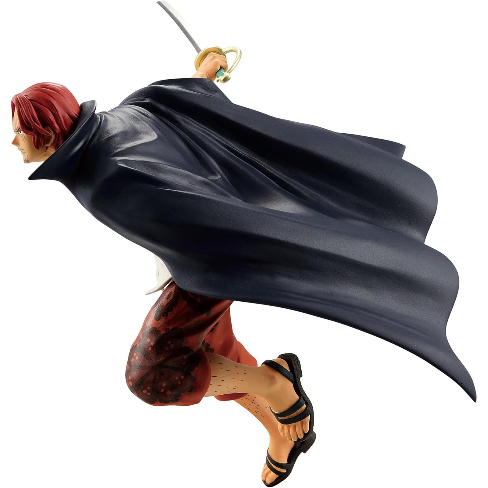 Una figura de un personaje de manga en acción. El personaje sostiene una espada.