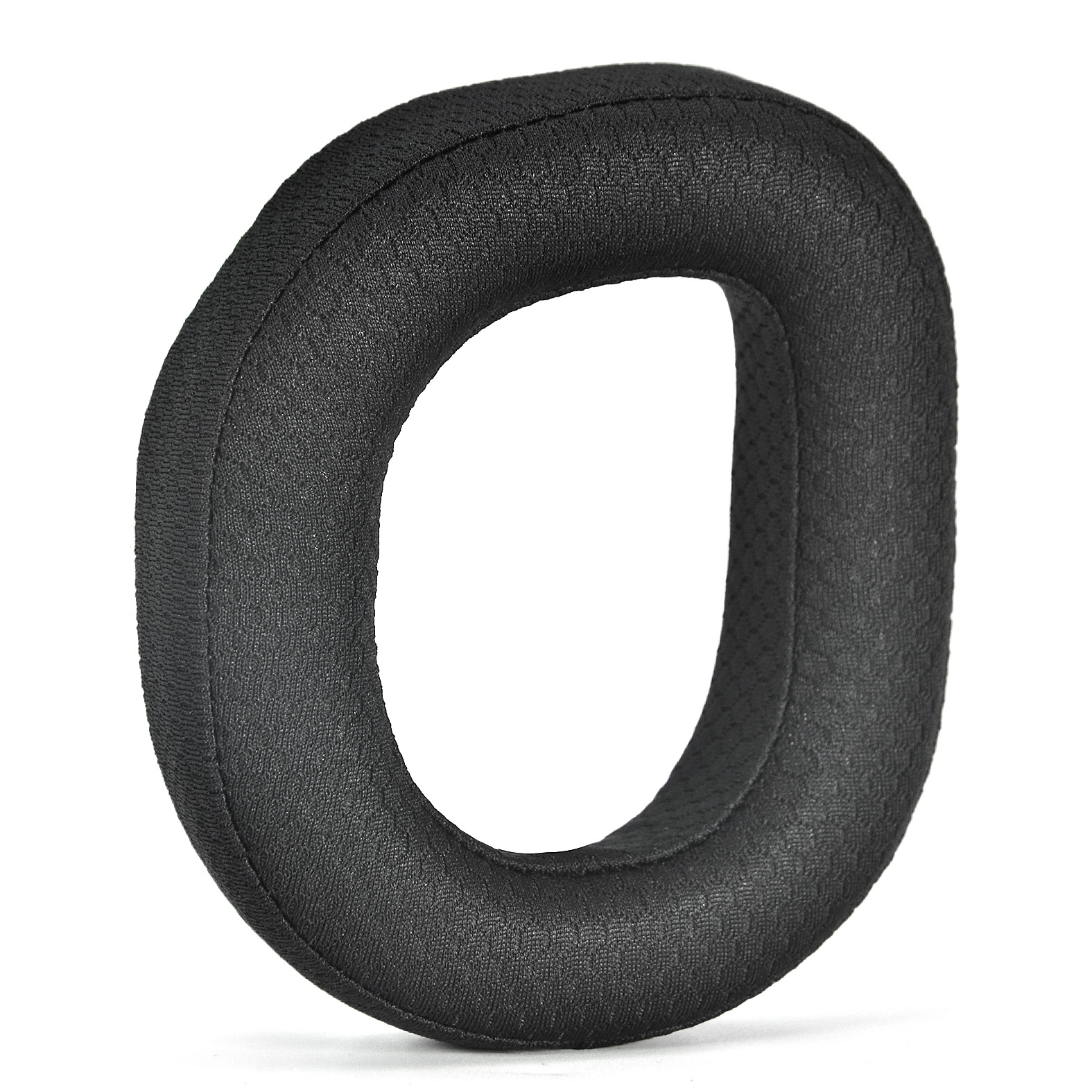 Un cuscinetto per cuffie nero a forma di ciambella. È realizzato in materiale poroso.