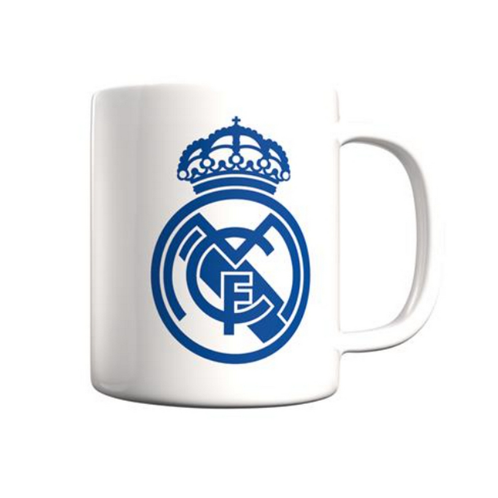 Taza blanca con el logo del Real Madrid en azul. El logo es una corona sobre un círculo.