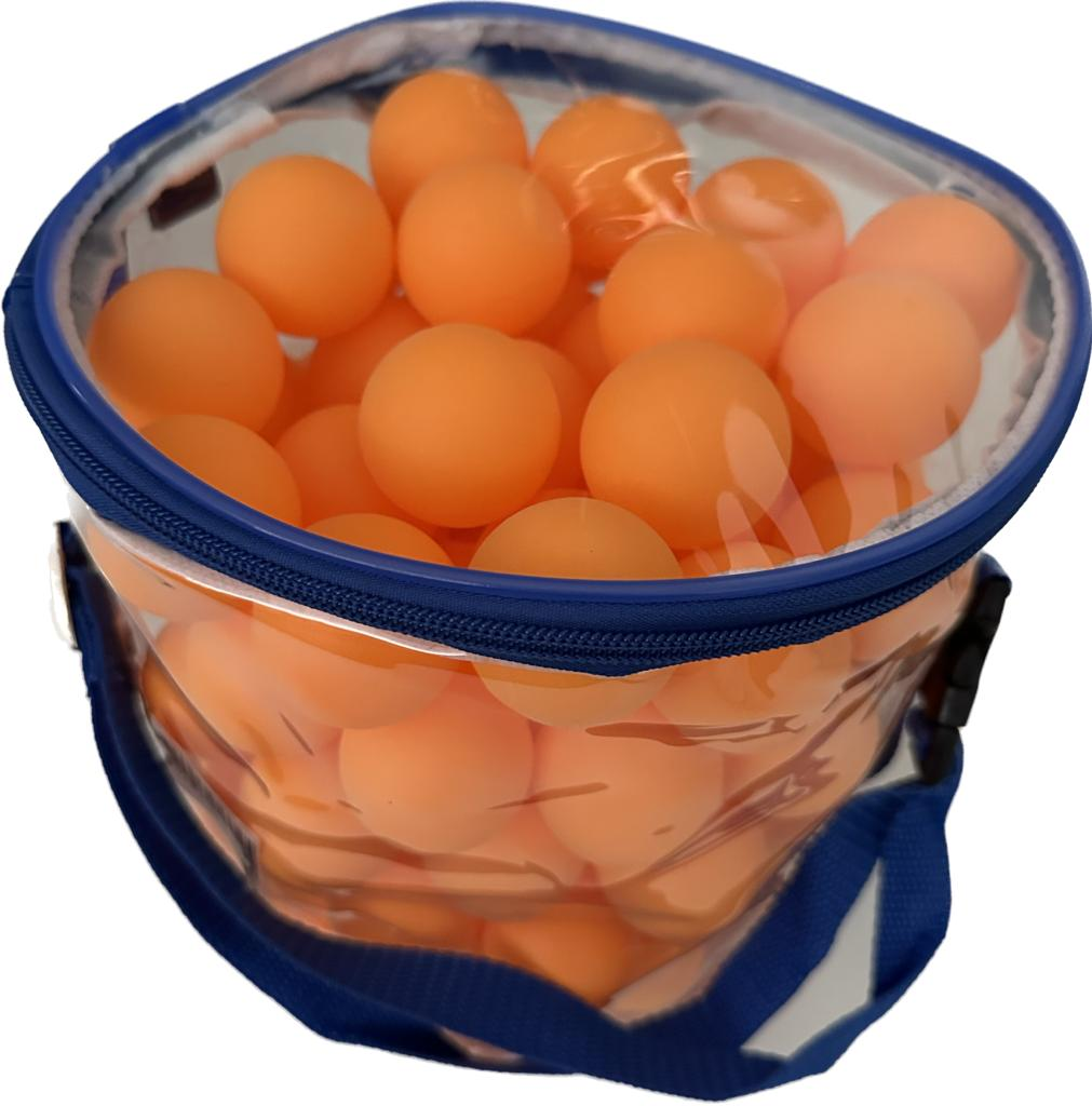 Orange ping pong balls inside a clear plastic bag with a blue trim.