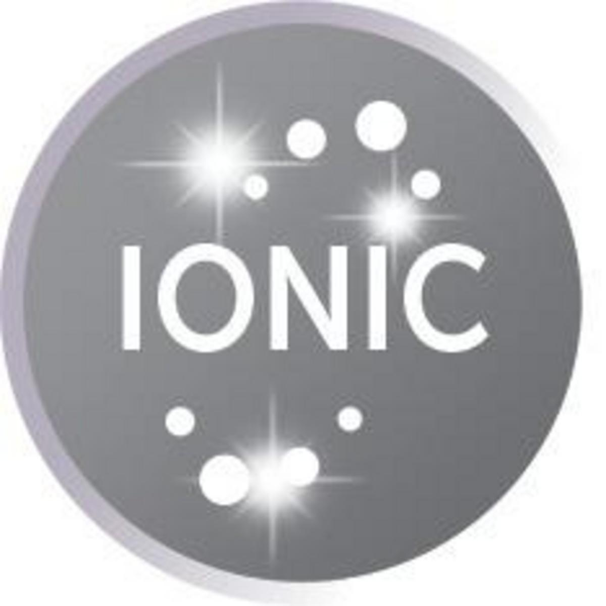 Un cerchio grigio con la parola IONIC e punti bianchi e stelle attorno.