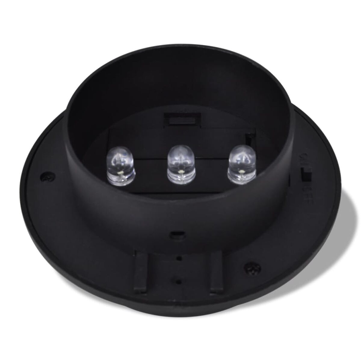 Una luce LED nera per esterni con tre lampadine trasparenti in un alloggiamento rotondo.