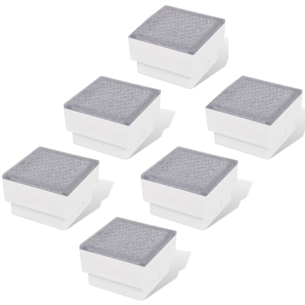 Sei luci quadrate bianche con top smerigliati disposte in diagonale.