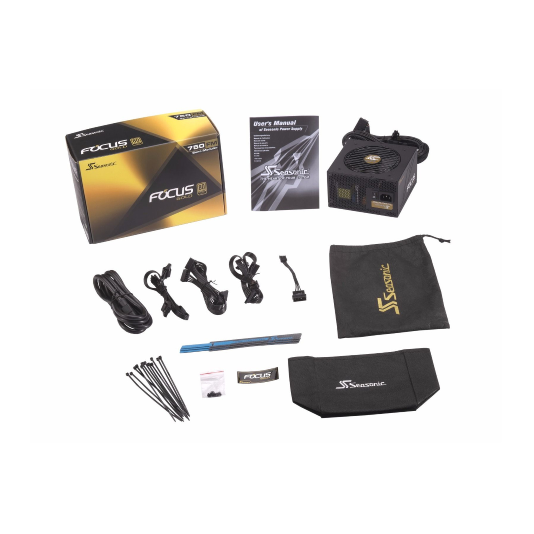 Zestaw części komputerowych. Zawiera pudełko z zasilaczem, kable, instrukcje i akcesoria.