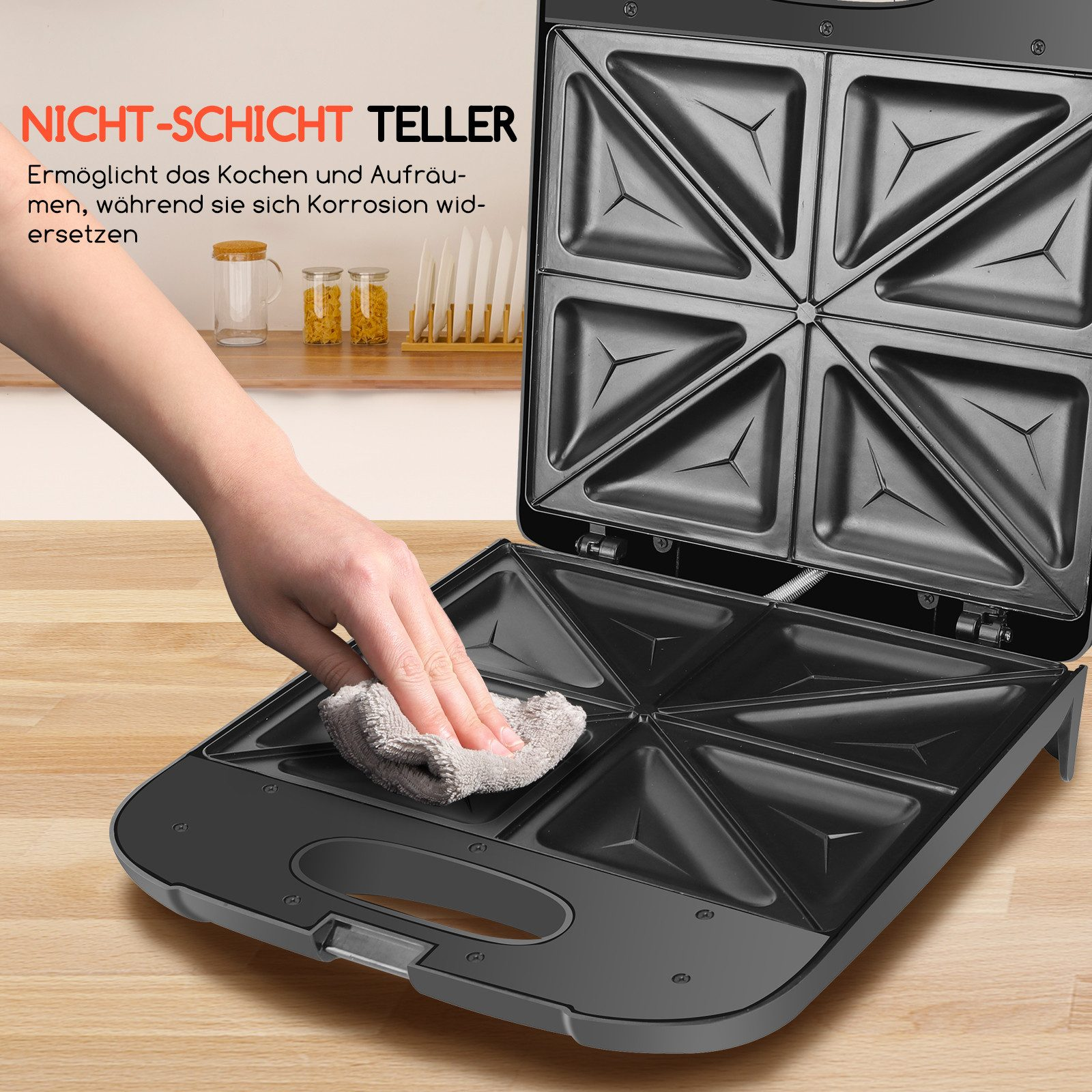 Hand wischt Oberfläche eines Sandwichmakers mit einem Tuch, Text im Hintergrund.
