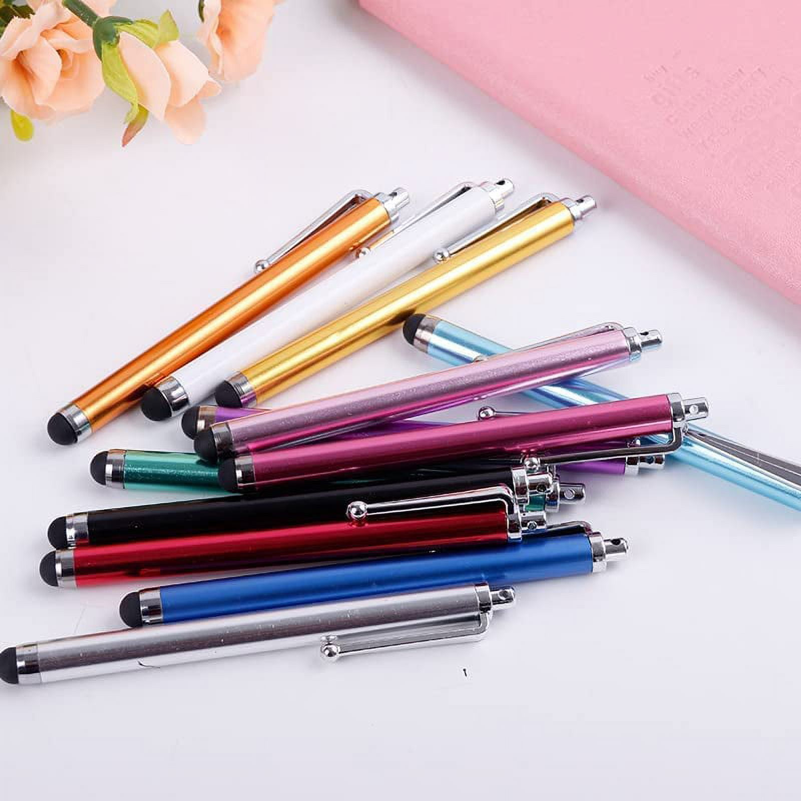 Eine Gruppe bunter Stift-Stifte auf einer weißen Oberfläche.